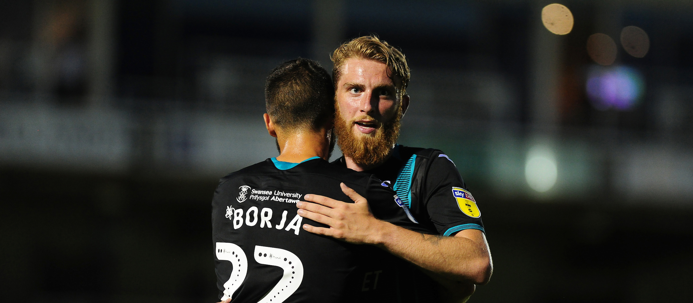 Oli McBurnie and Borja celebrate the win