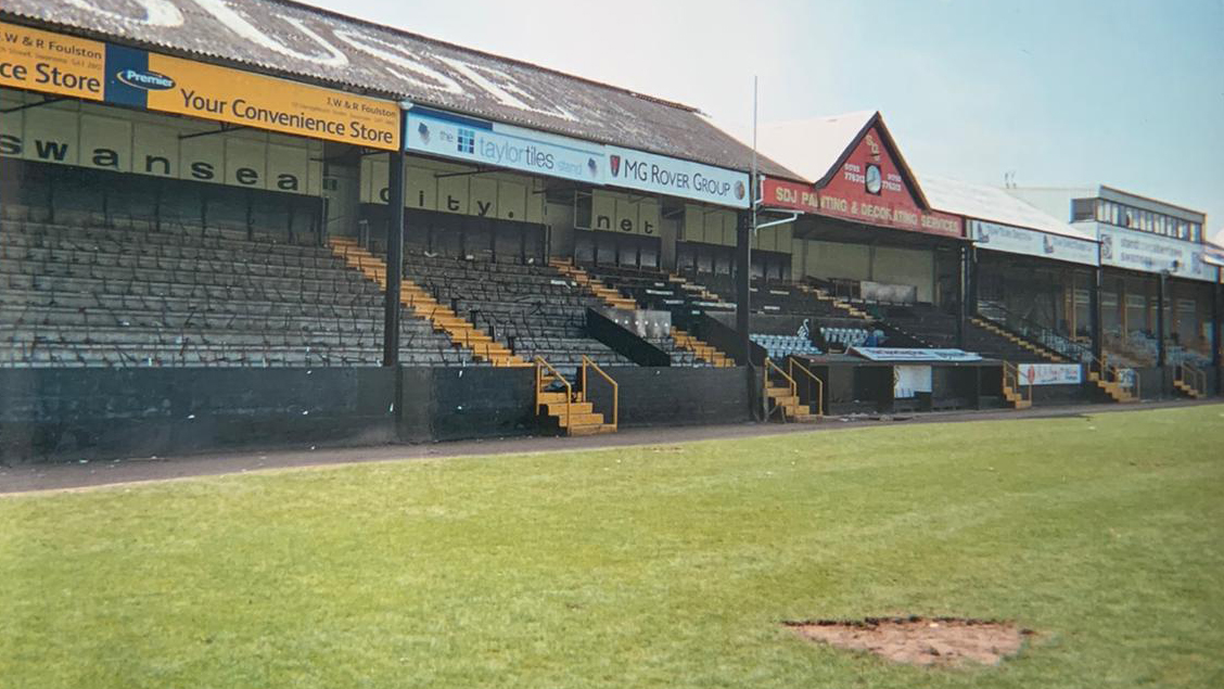 Turf and seats were ripped from the pitch and south stand after the final game at the Vetch Field. Photo courtesy of Kristian O'Leary