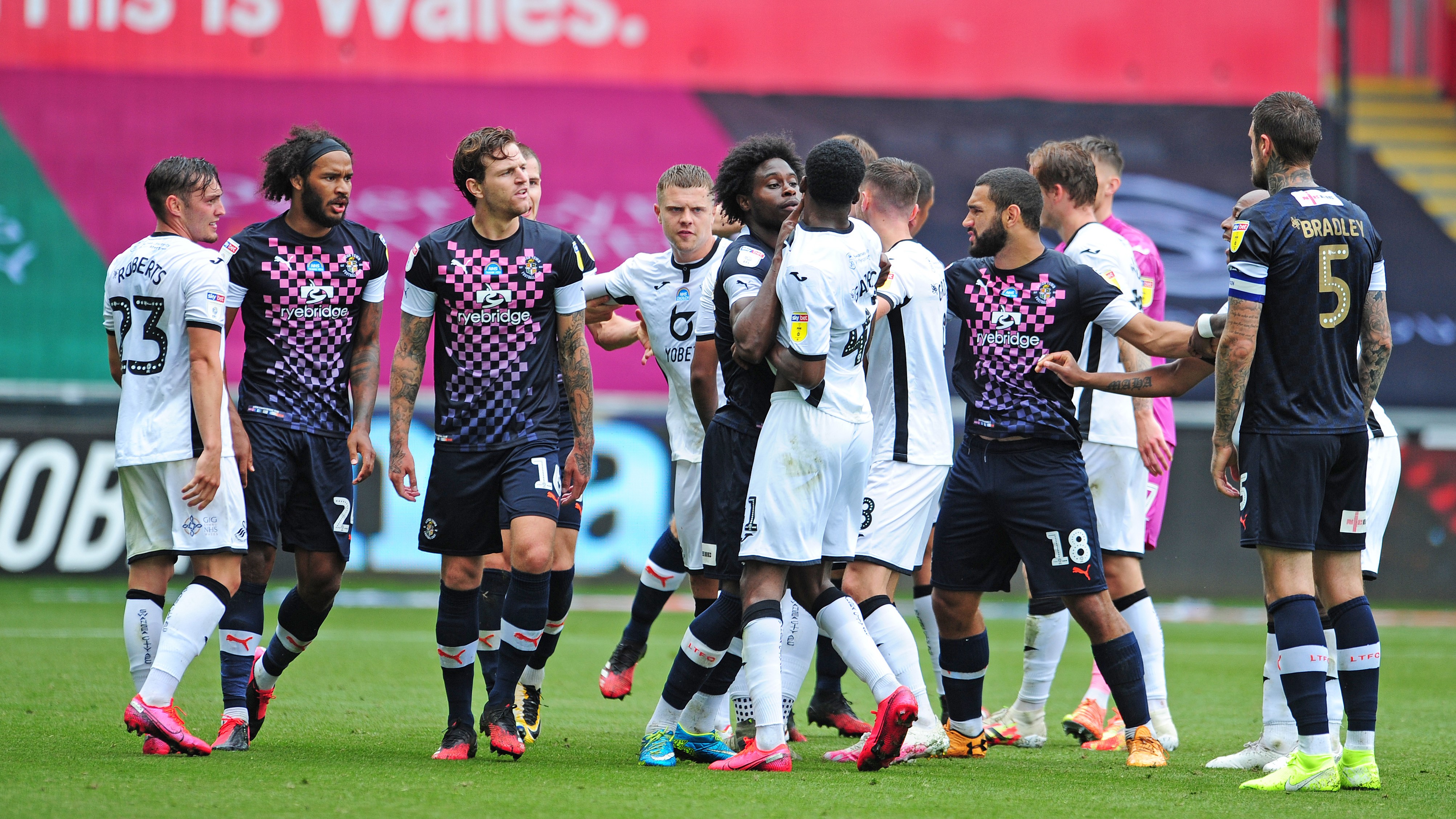 Luton Garrick and Mpanzu clash