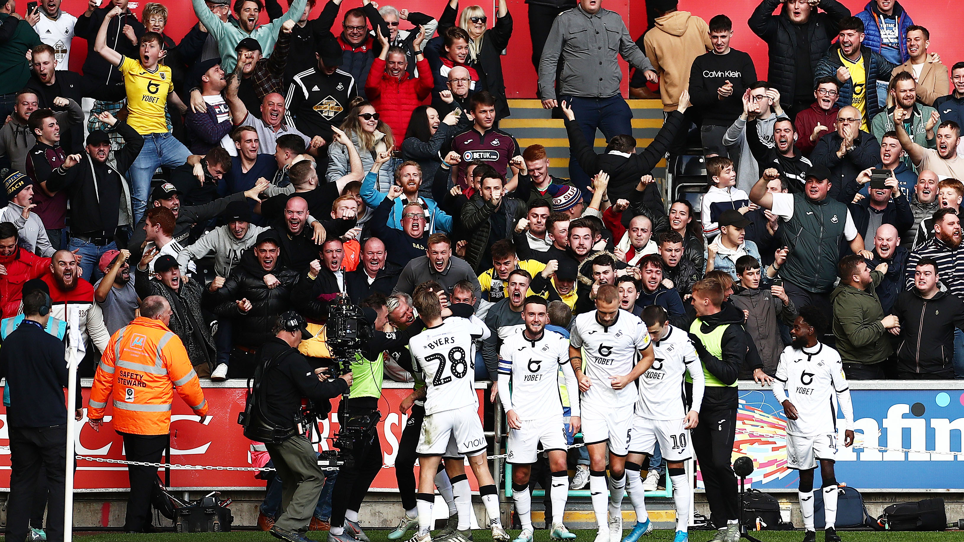 Cardiff 1-0 Swansea: Fans In The Stands (PICTURES)