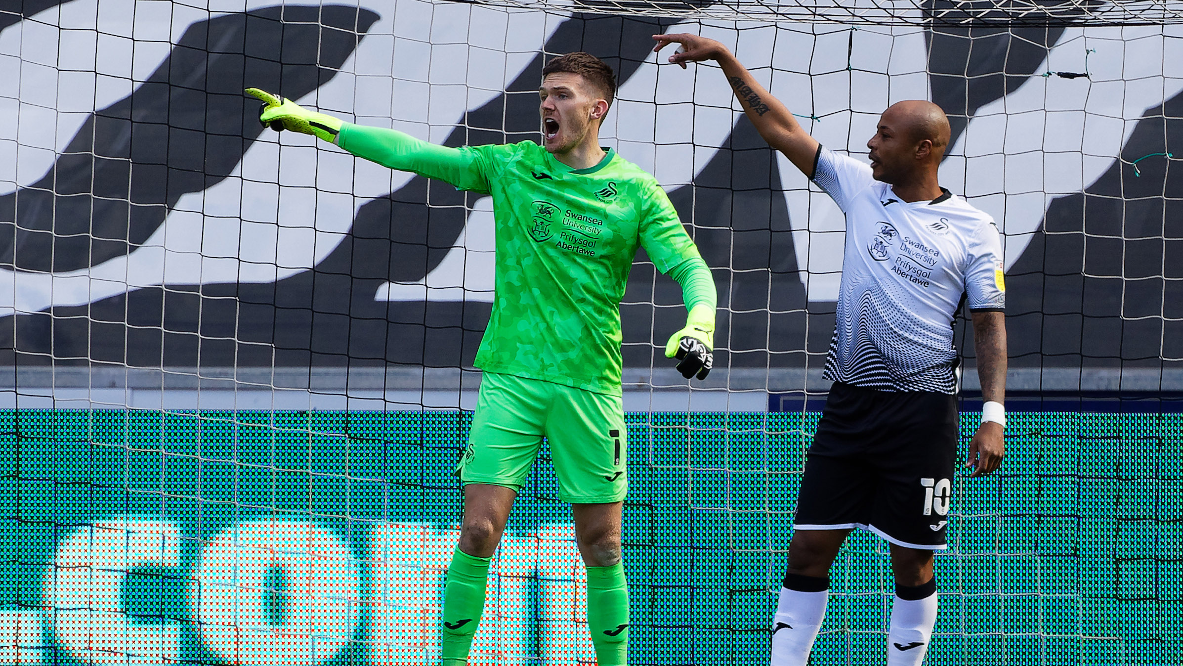 Freddie Woodman and Andre Ayew