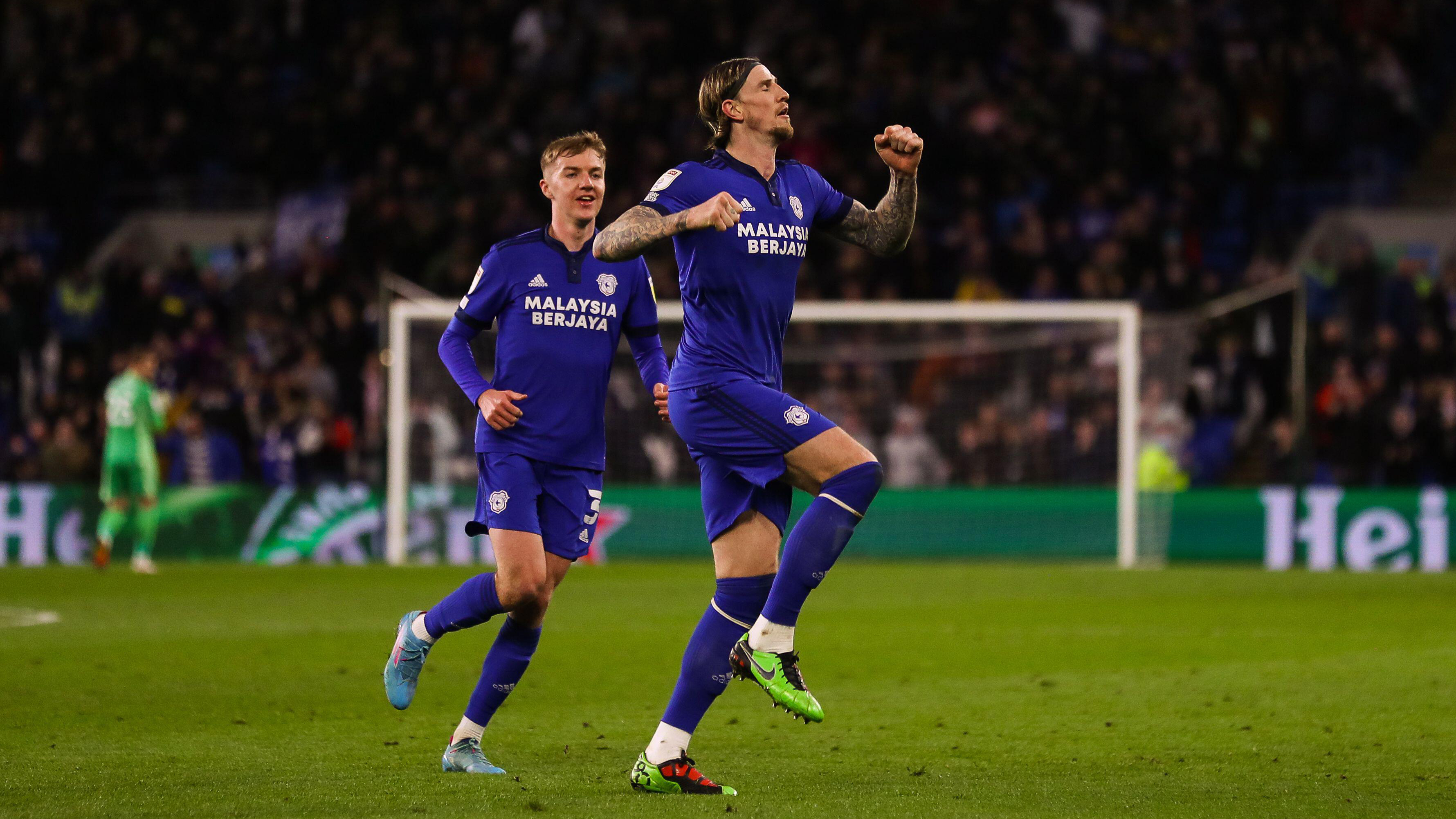 Cardiff City defender Aden Flint celebrates scoring a goal