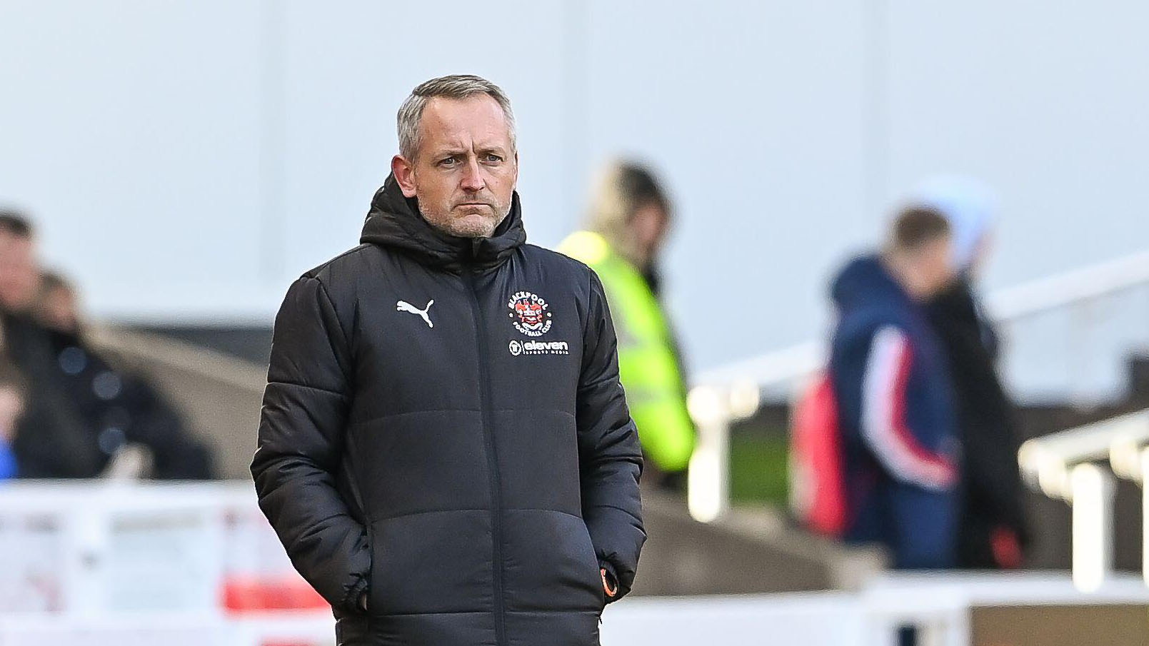 Blackpool manager Neil Critchley watches from the touchline