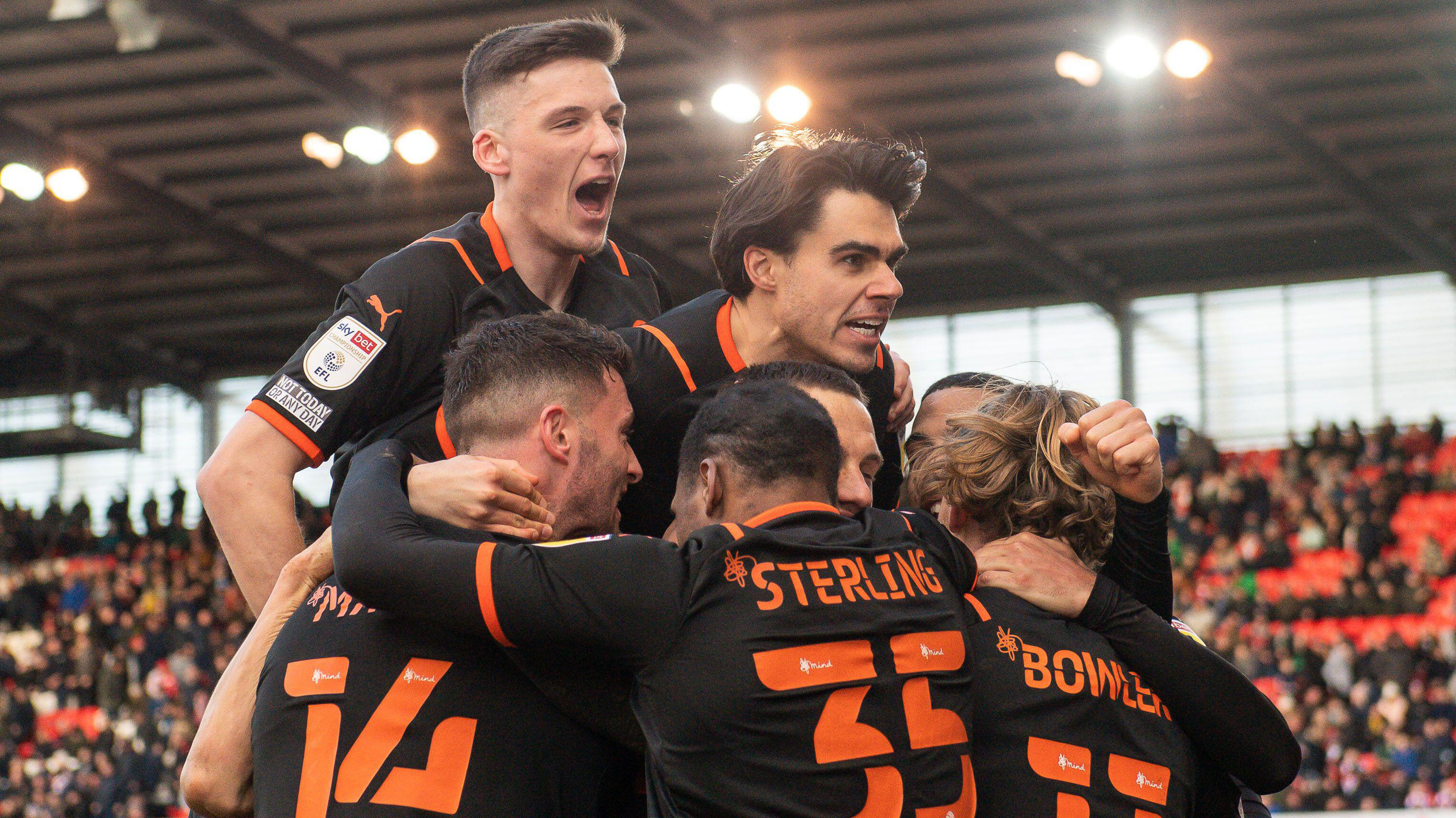 Blackpool players celebrate a goal