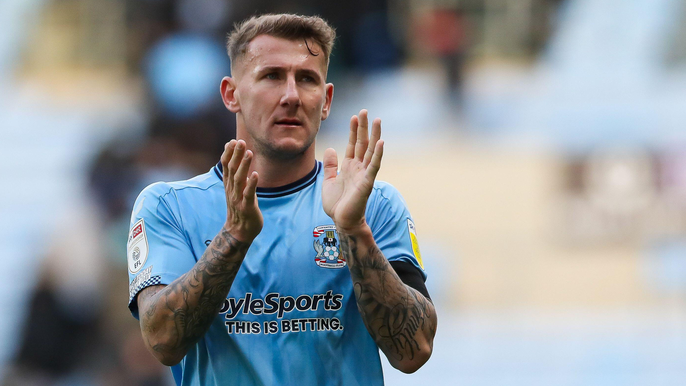 Kyle McFadzean from Coventry City claps fans