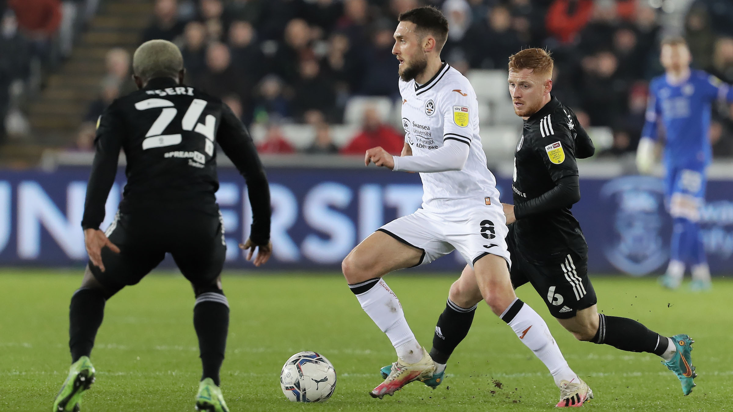 Matt Grimes carries the ball against Fulham