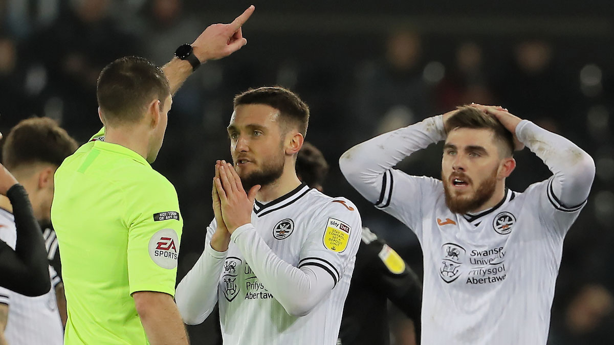 Referee Jarred Gillett sends Ryan Manning off 