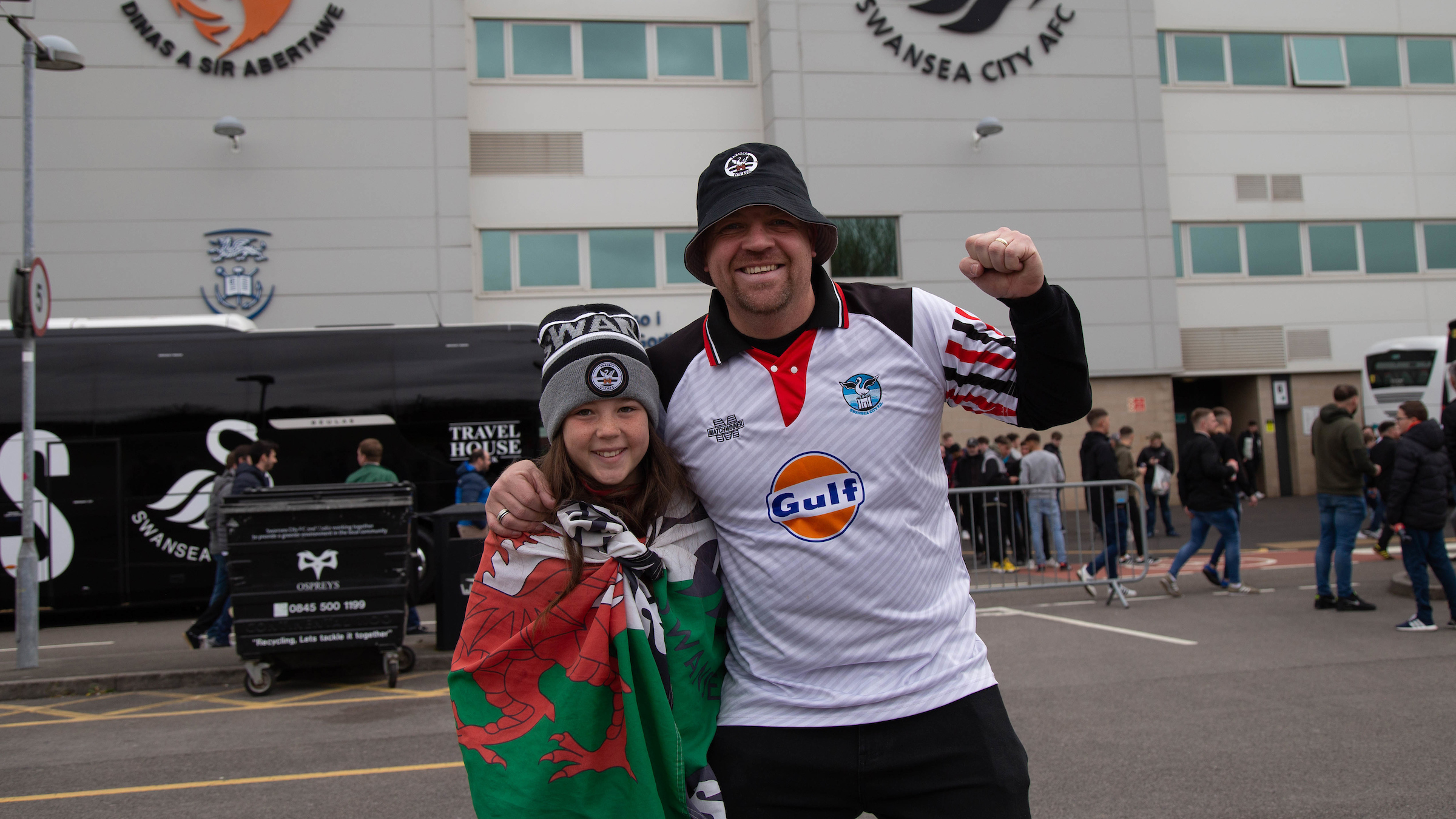 Two Swansea fans outside the Swansea.com Stadium