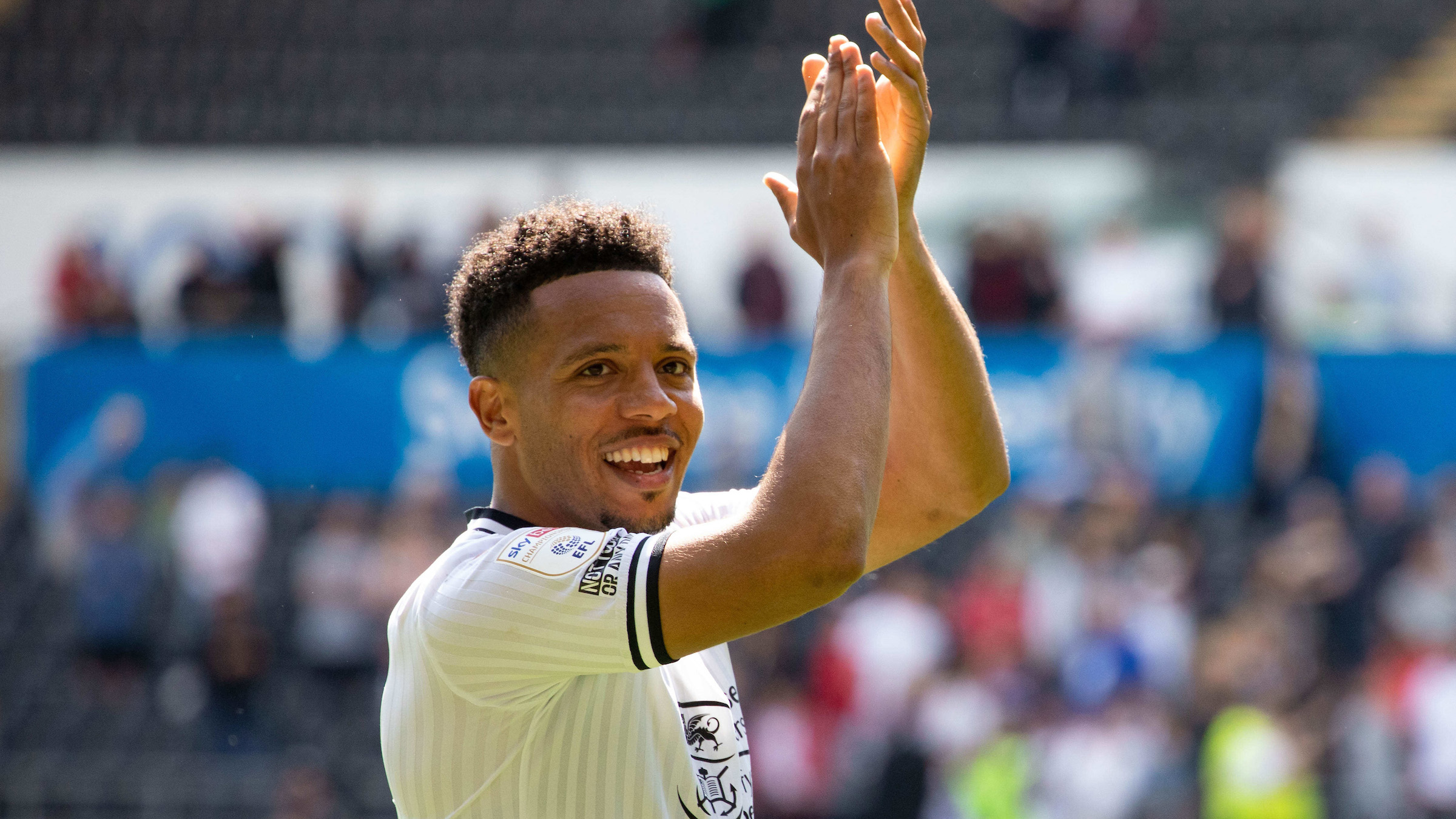 Korey Smith applauds fans