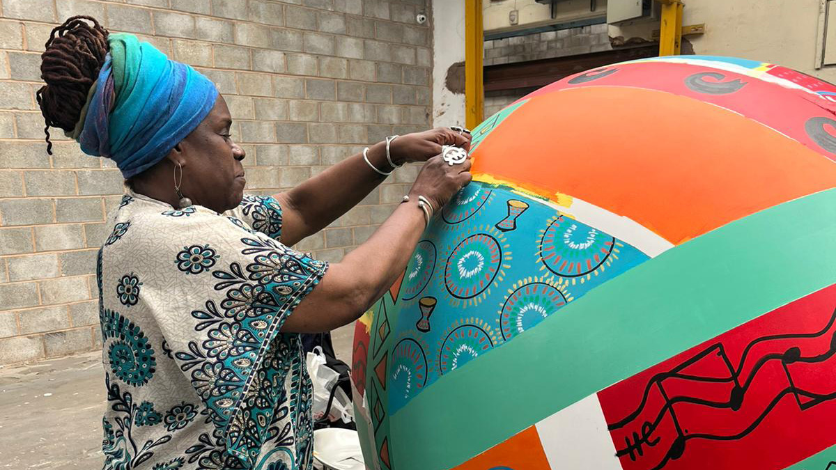 Pauline Bailey completing her globe for Birmingham trail