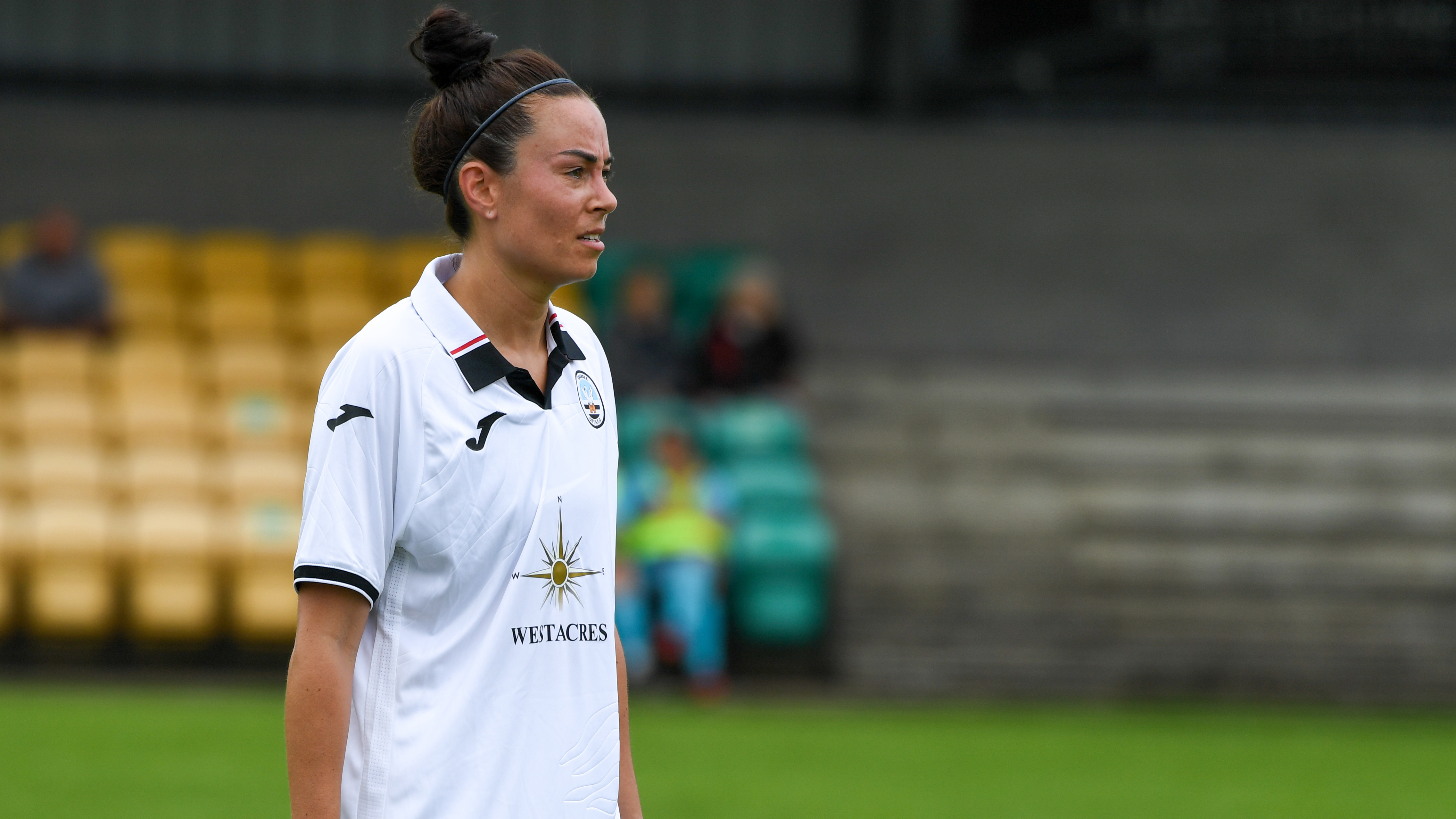 Close up of Alicia Powe playing for Swansea City Ladies