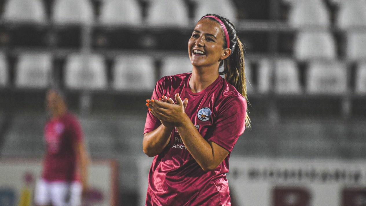 Emma Beynon clapping warming up ahead of Champions League match