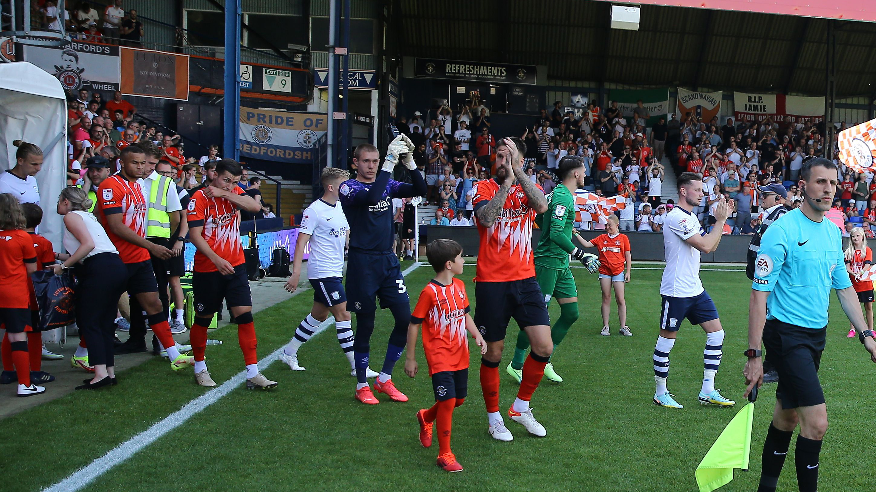 Luton Town team walking out of the tunnel at their home ground