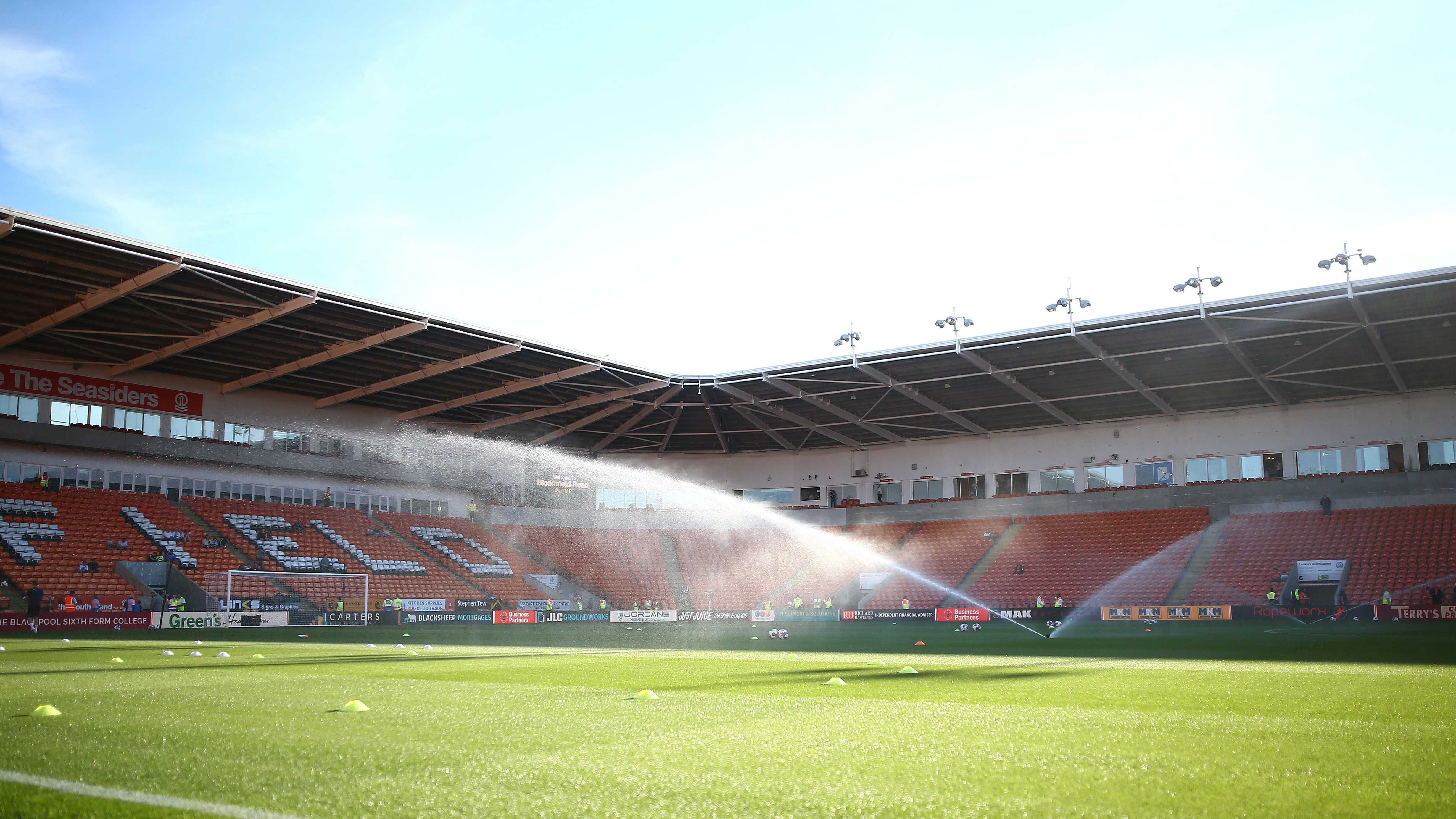 Sprinklers water the pitch at Bloomfield Road