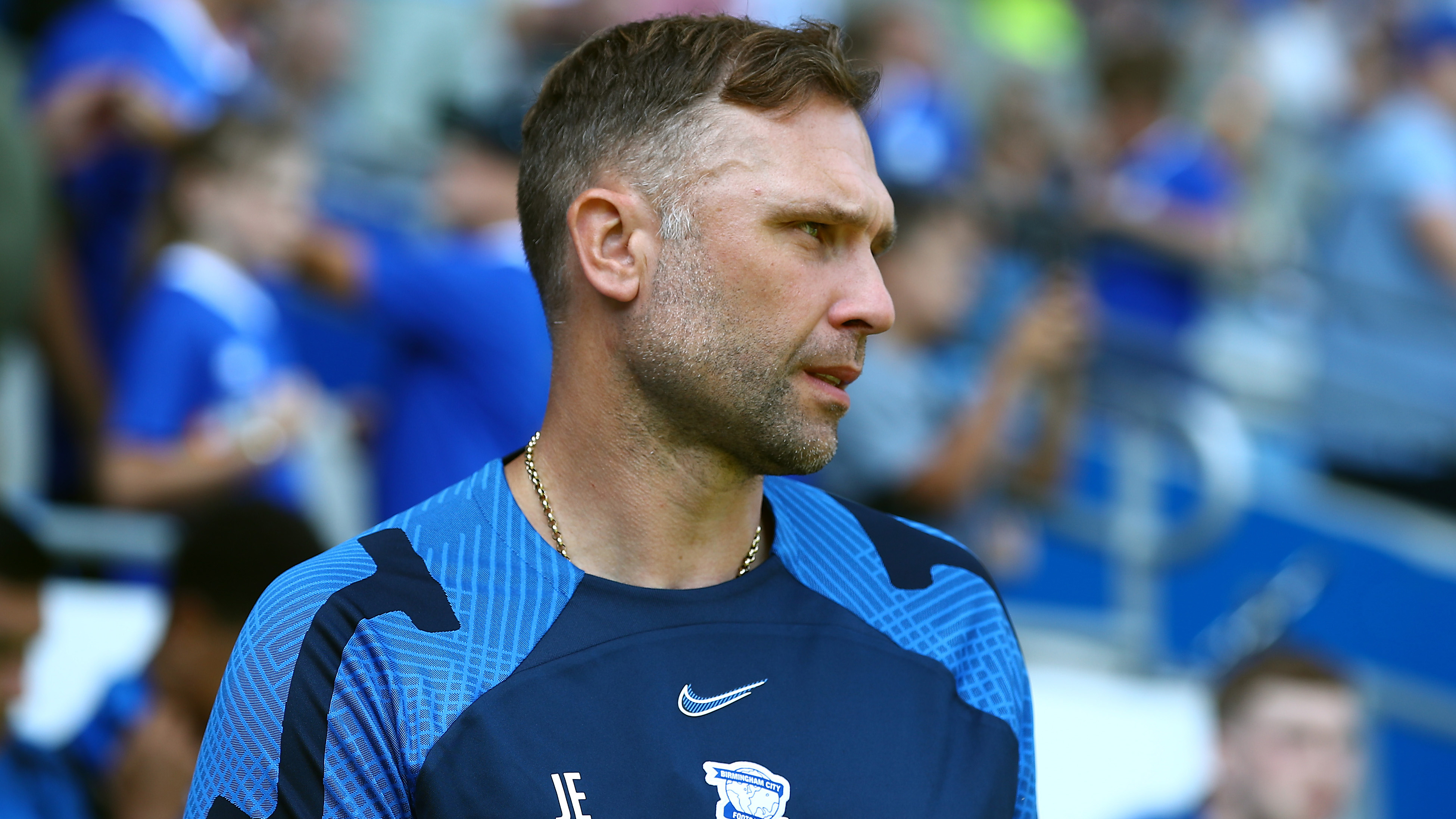 John Eustace in Birmingham City tracksuit on the touchline