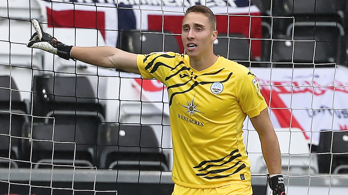 Steven Benda close up against QPR