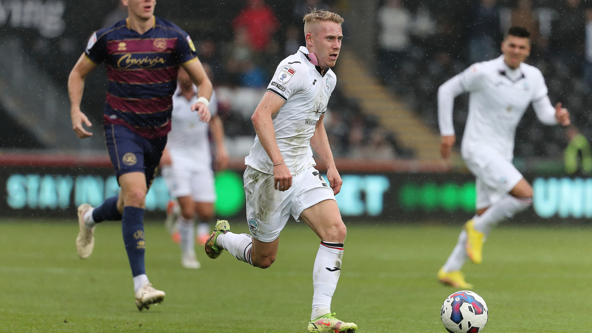 Ollie Cooper running with the ball against QPR