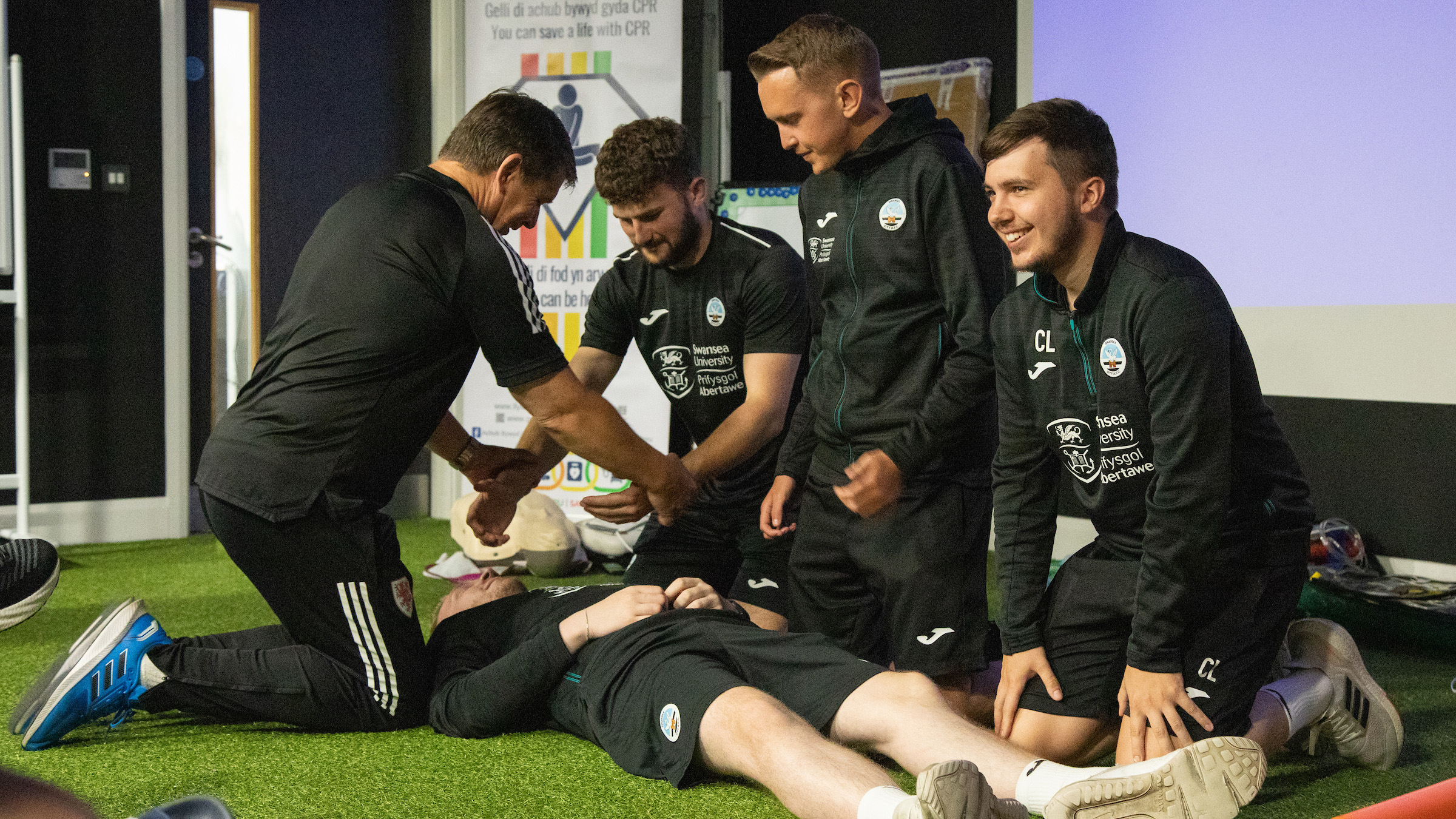 Swansea City staff take part in CPR training