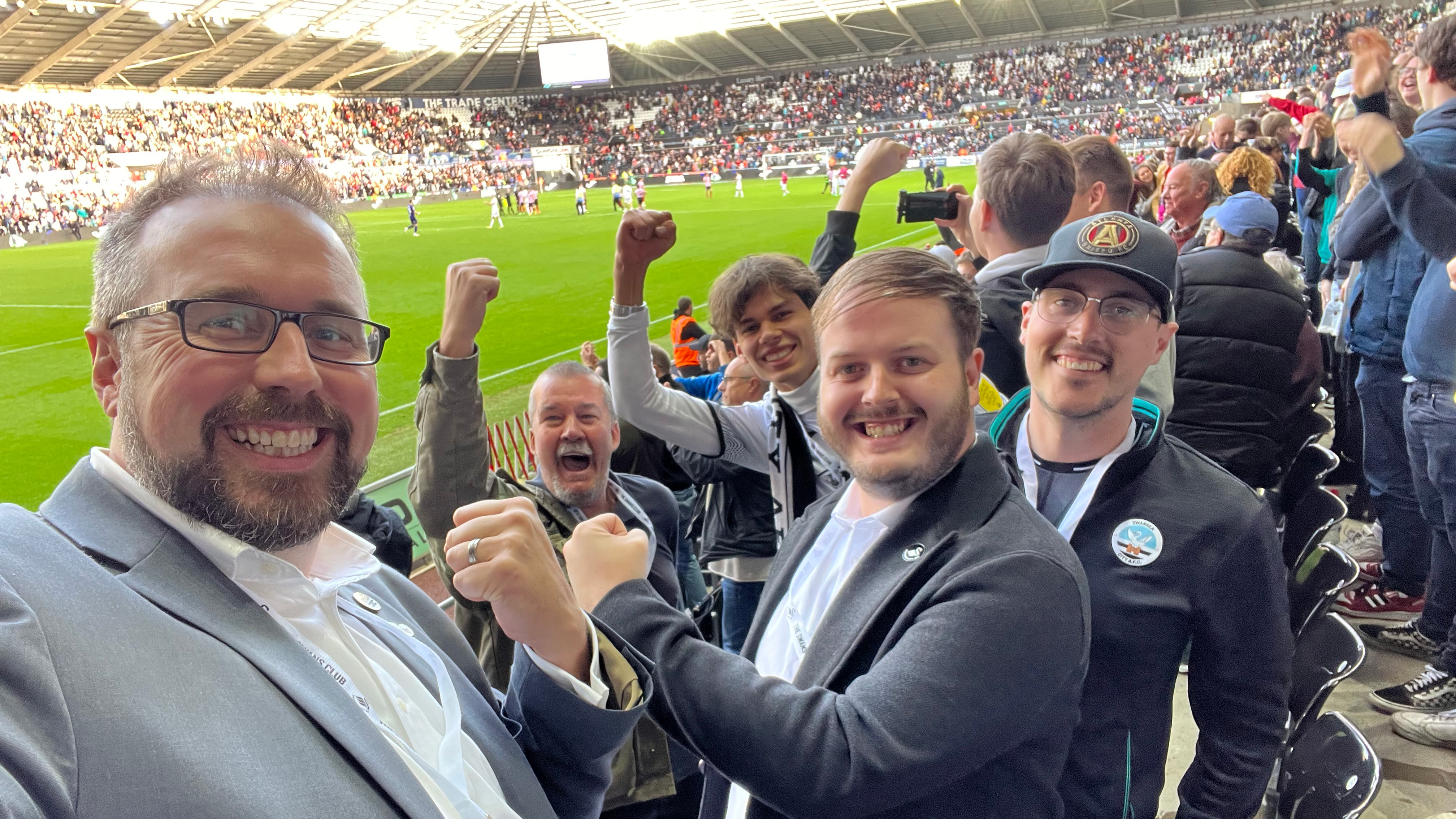 Global Jacks celebrating Swansea City win inside the Swansea.com Stadium