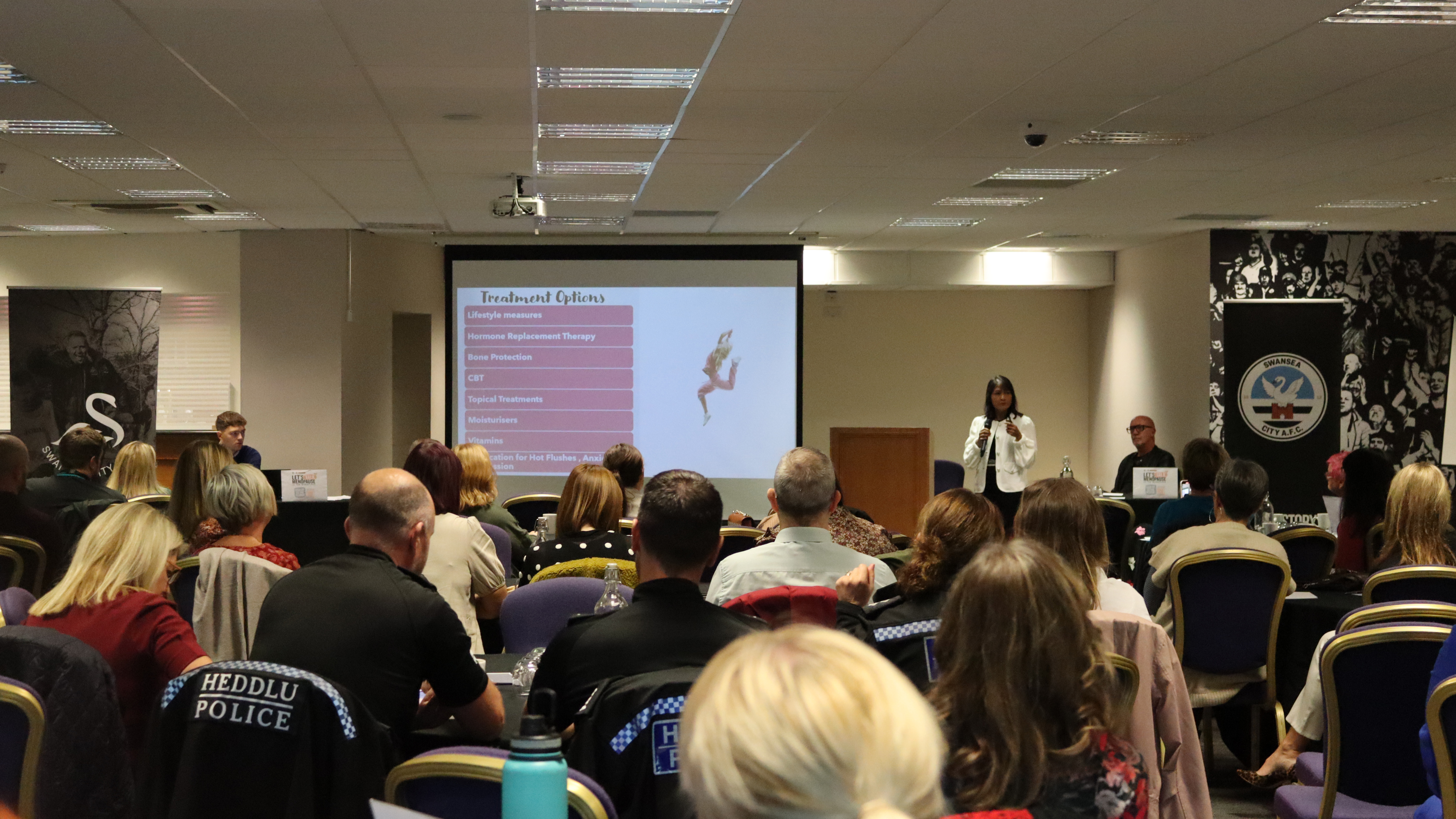 General shot of people enjoying a speech at the Menopause event