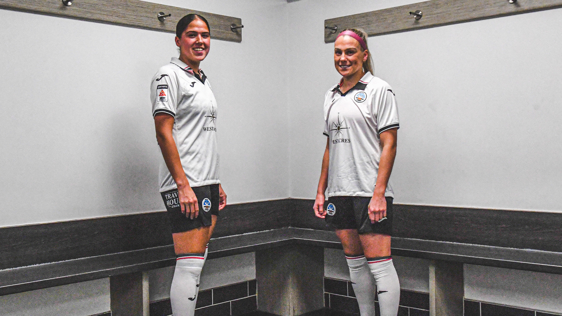 Jess Williams and Ellie Lake model new Swans Ladies kit with black shorts