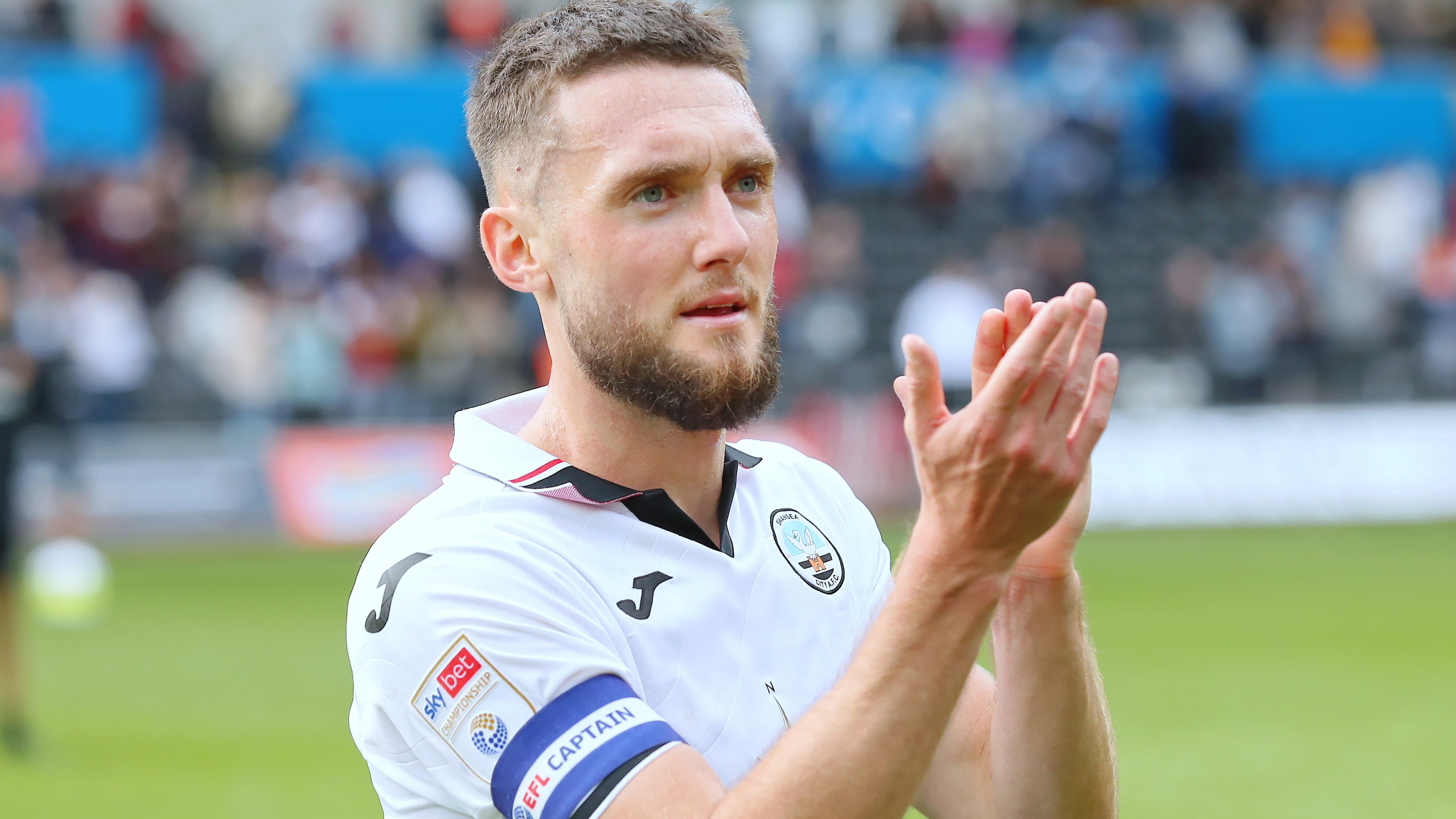 matt Grimes applauds fans