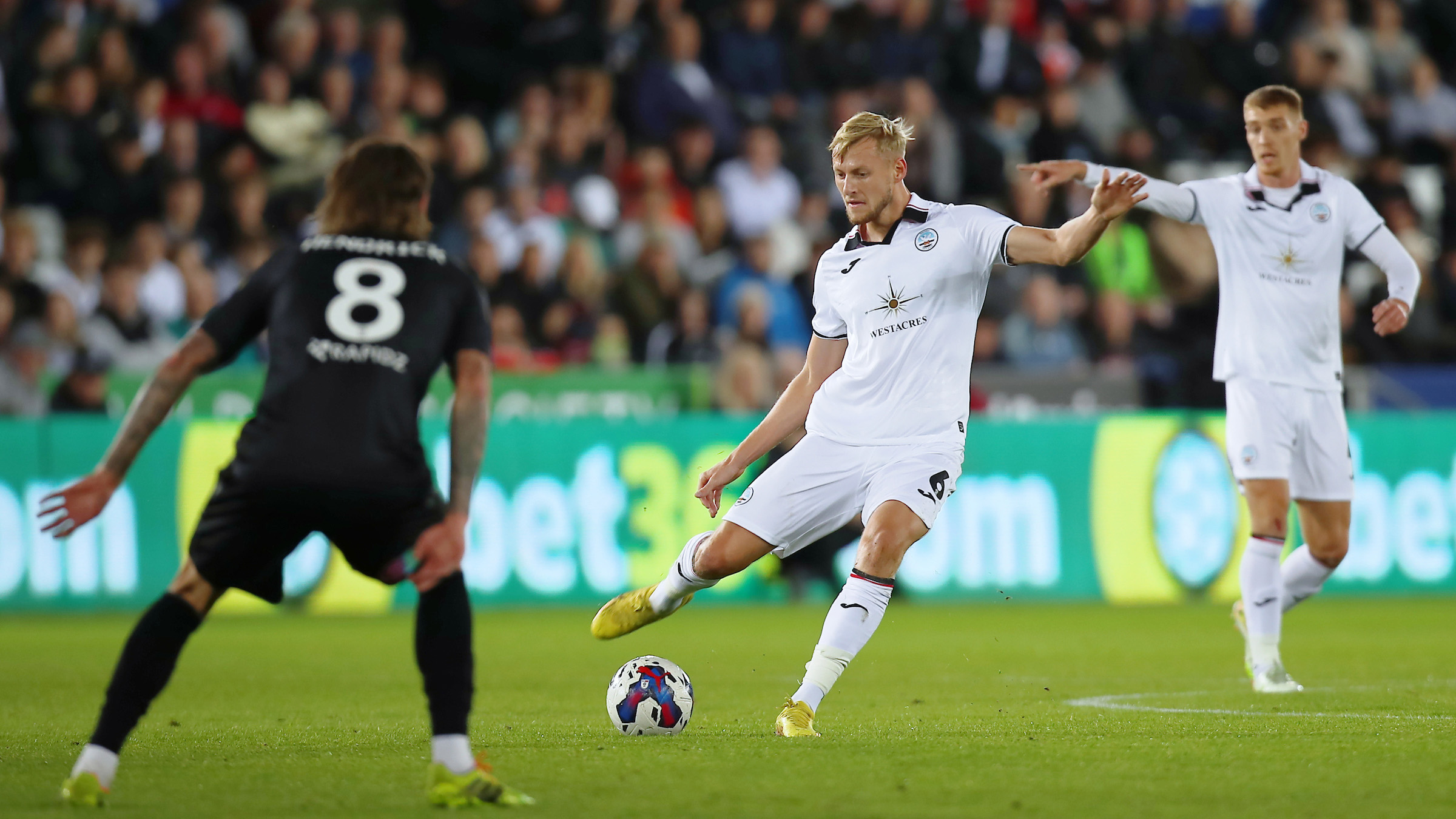 Harry Darling kicks the ball against Reading