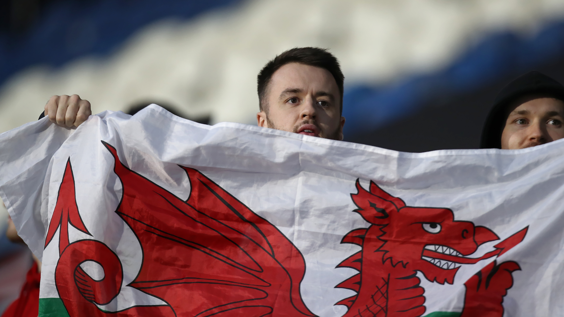 Fan with a Wales flag at Huddersfield Town