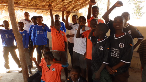 Children in Mkushi wearing Swansea City shirts