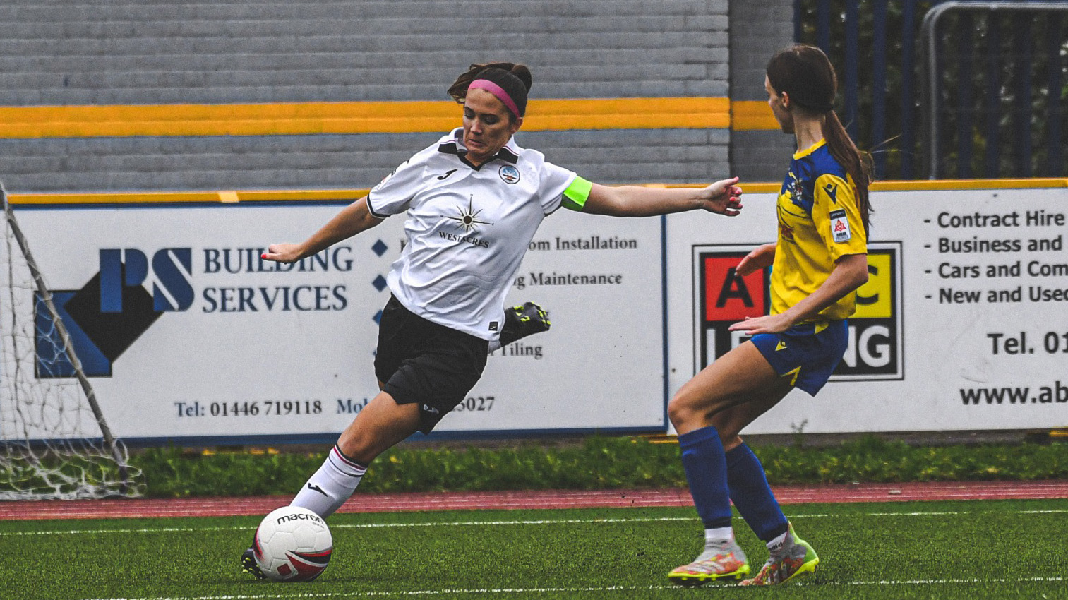 Emma Beynon kicks the ball for Swansea City Ladies