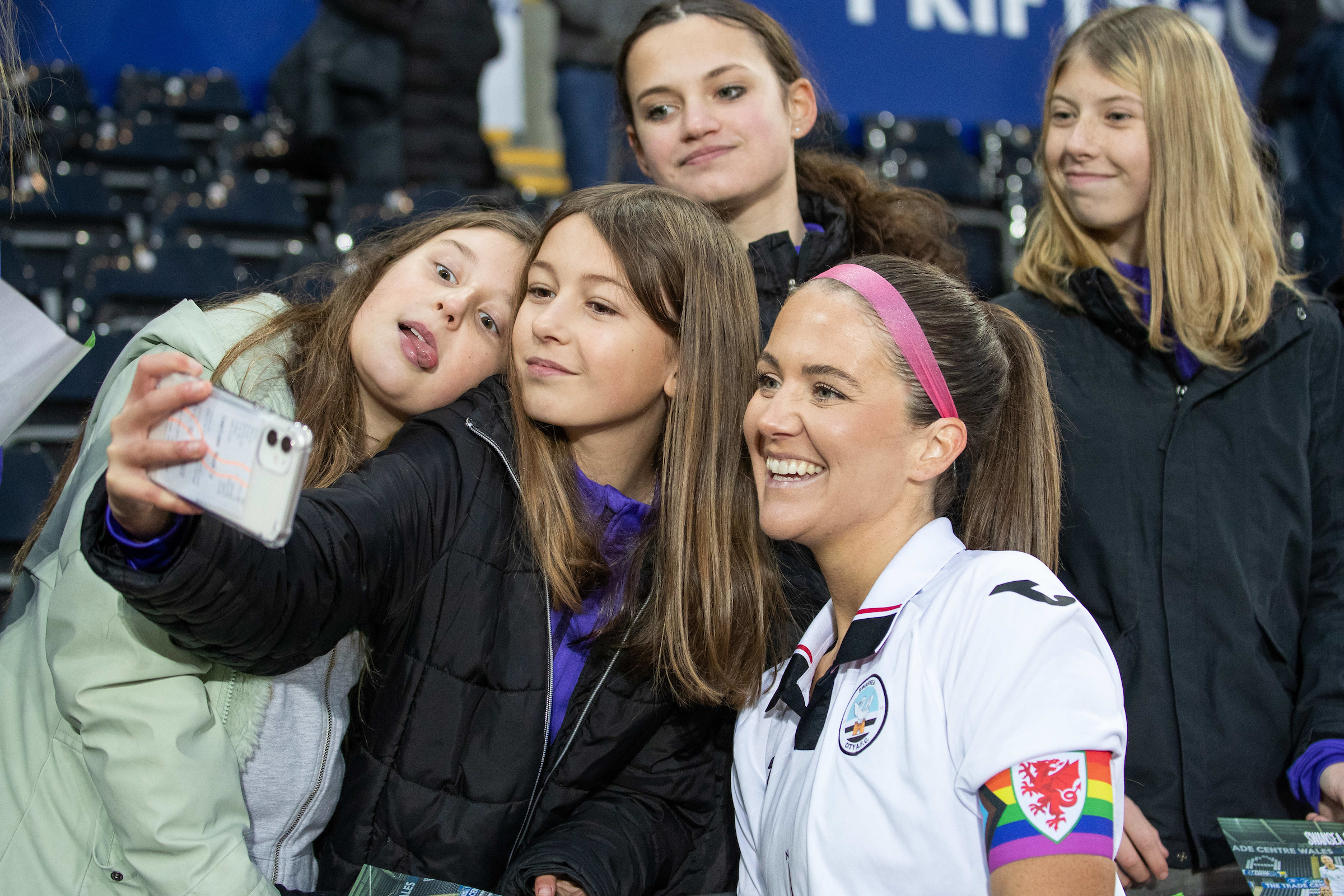 Emma Beynon poses for a selfie with fans