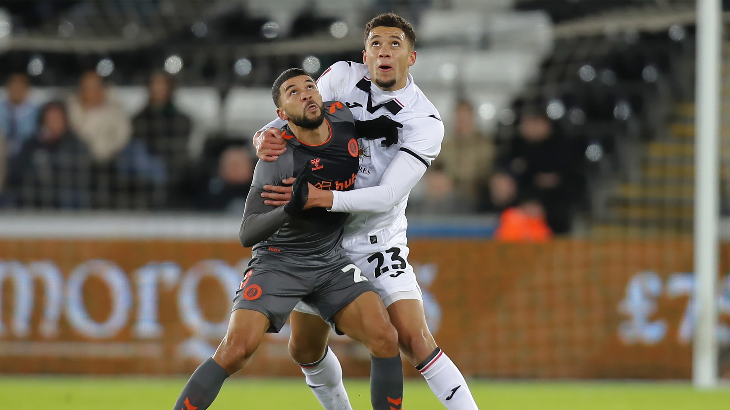 Nathan Wood challenges against Bristol City