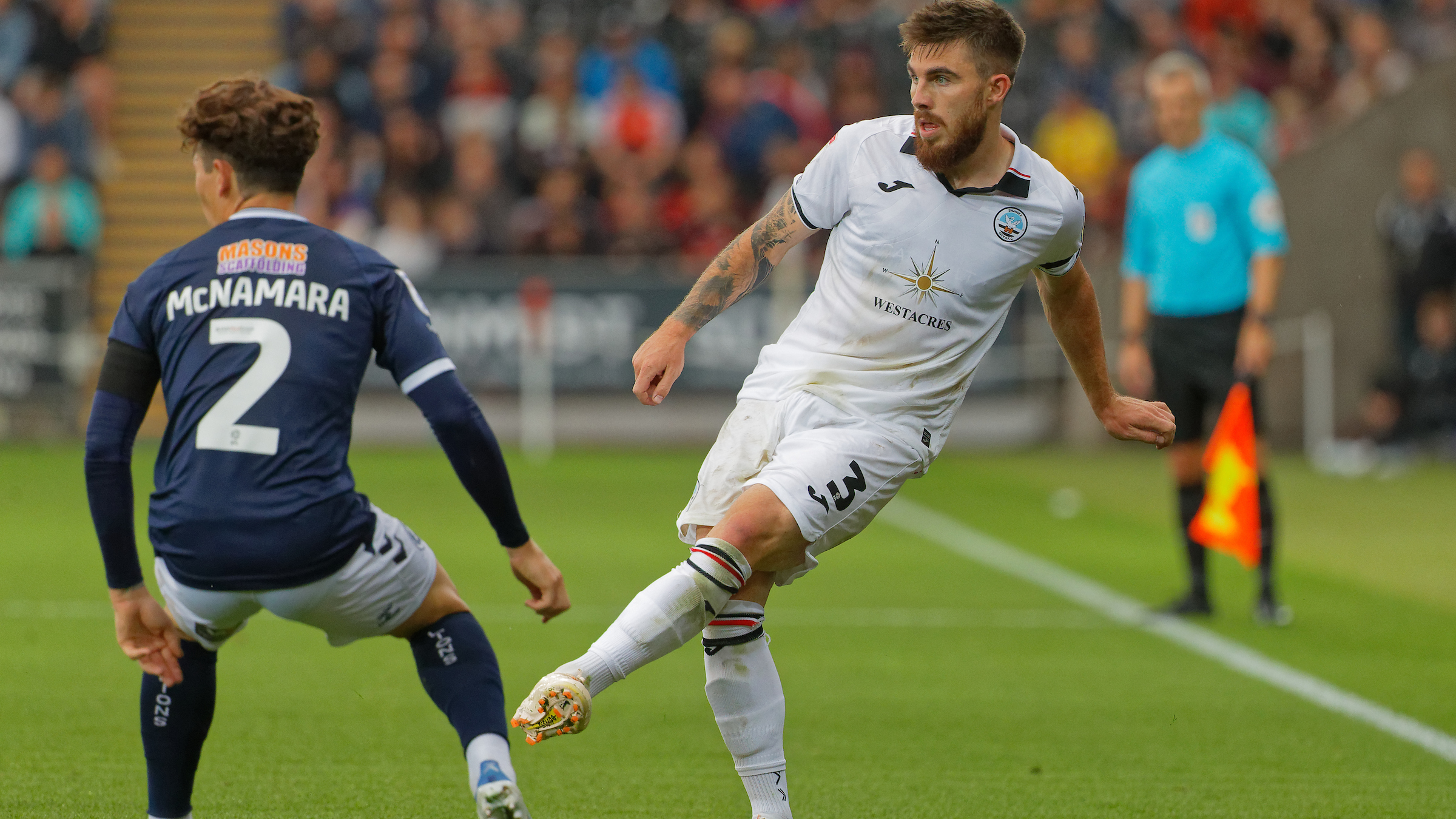 Ryan Manning passes the ball against Millwall