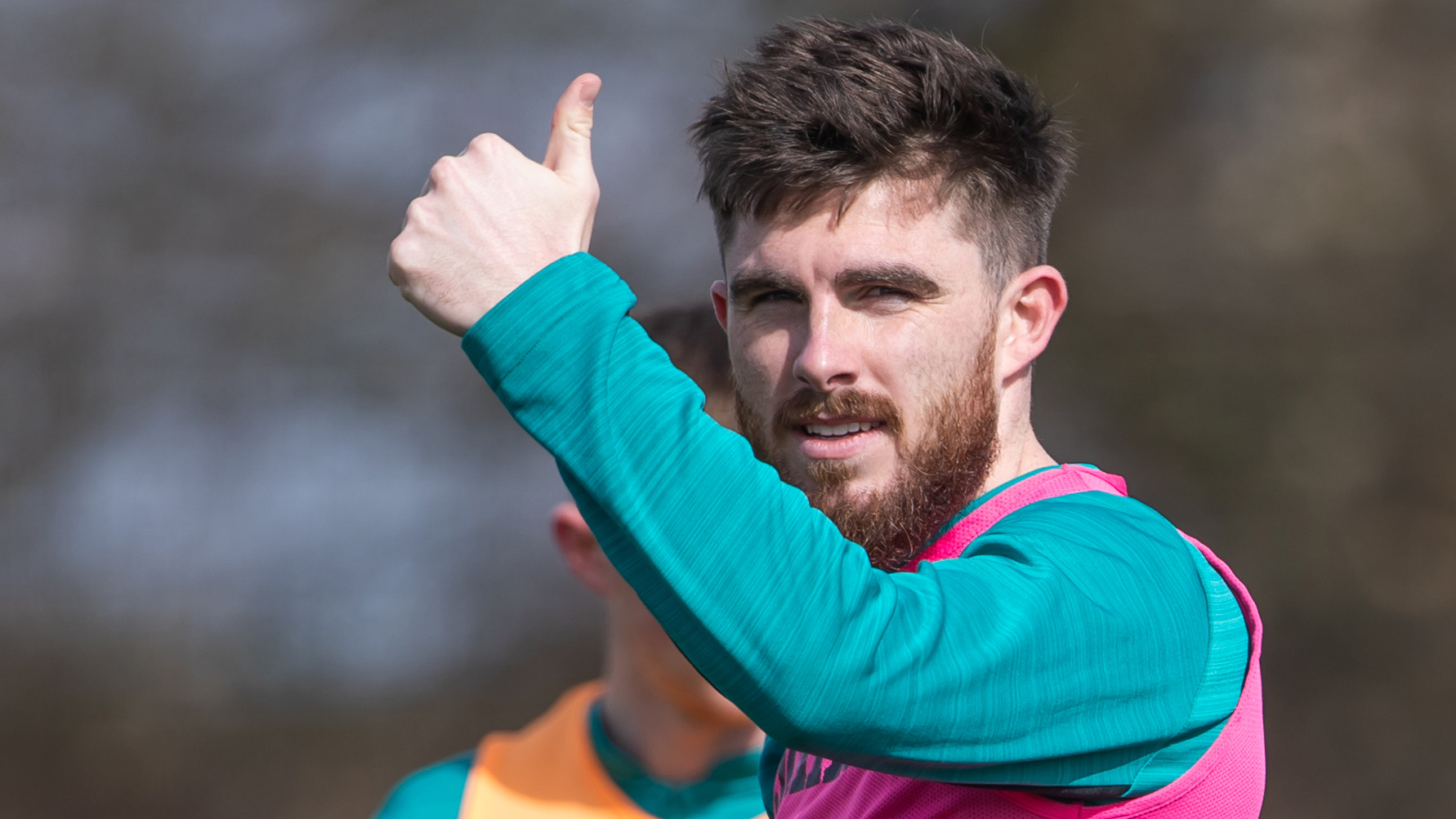 Ryan Manning thumbs up in training