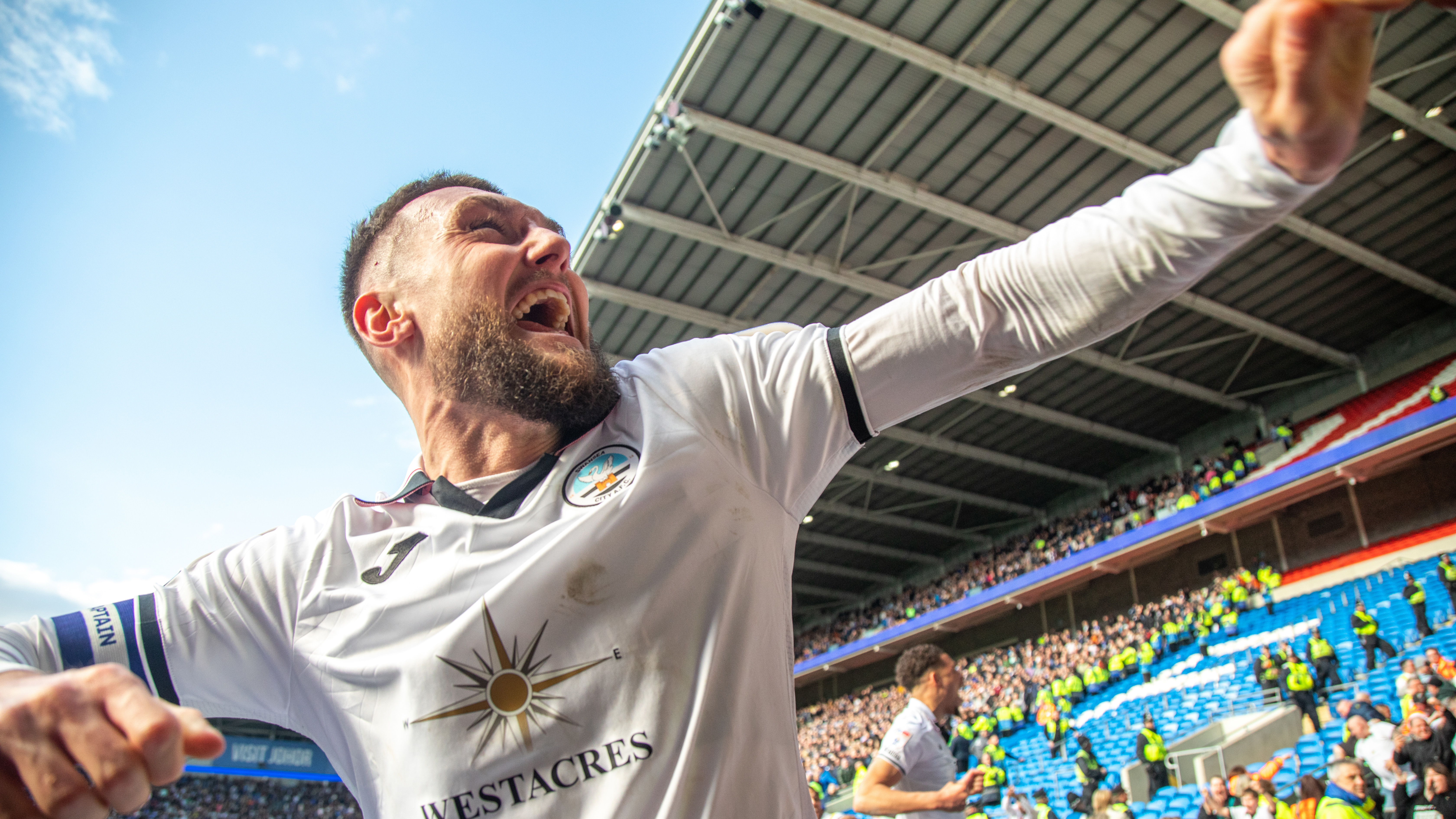 Matt Grimes celebrates win at Cardiff City