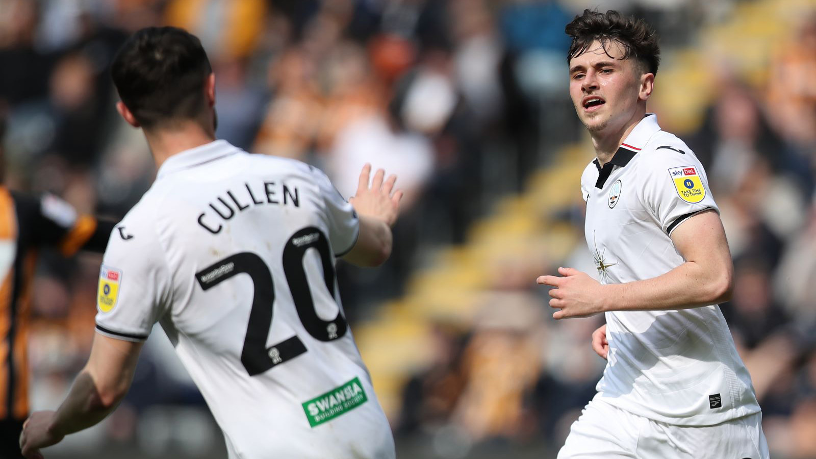 Cullen and Cundle celebrate Cundle's goal