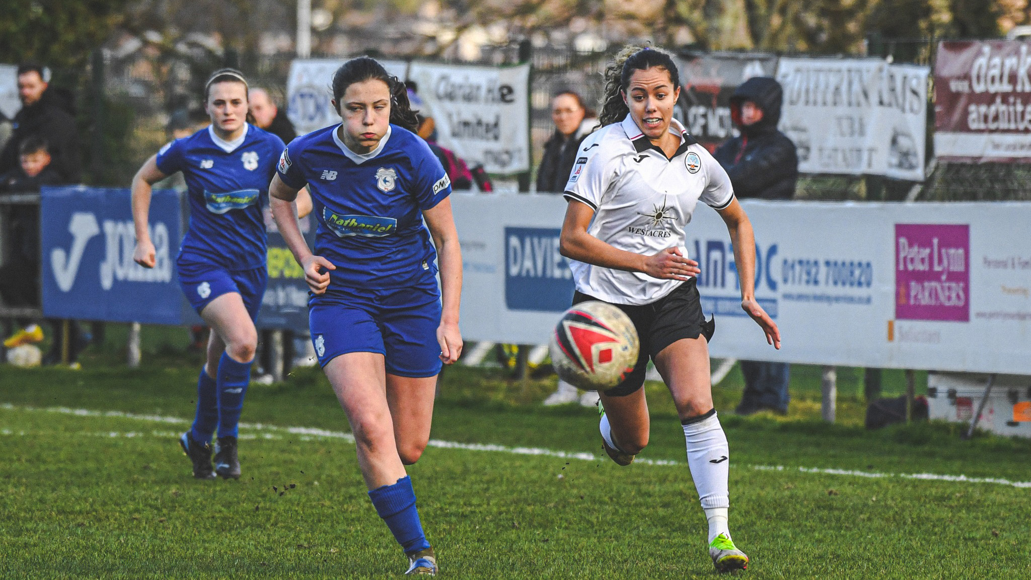 Monet Legall competes for the ball against Cardiff City