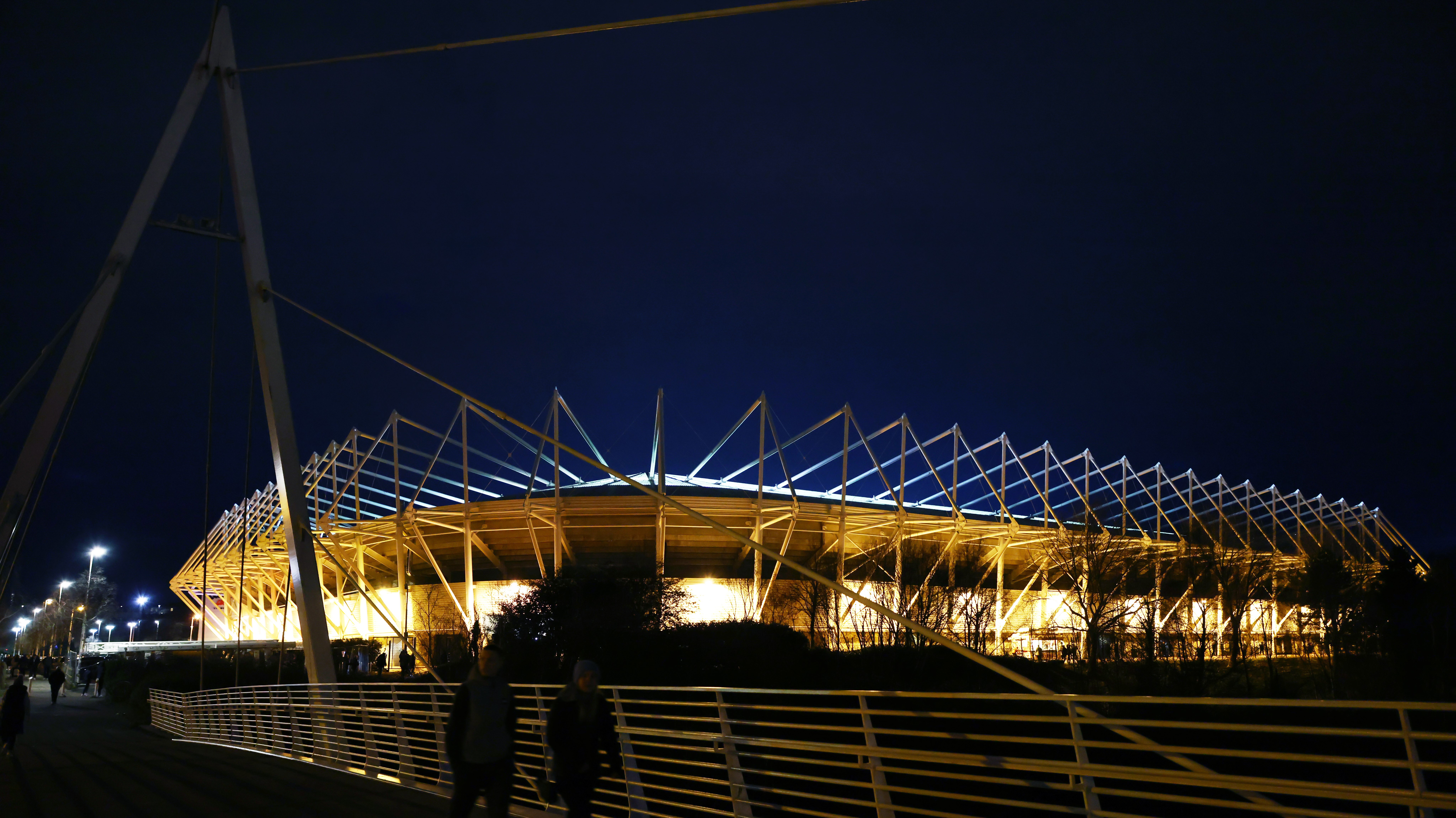 Outside the Swansea.com Stadium at night