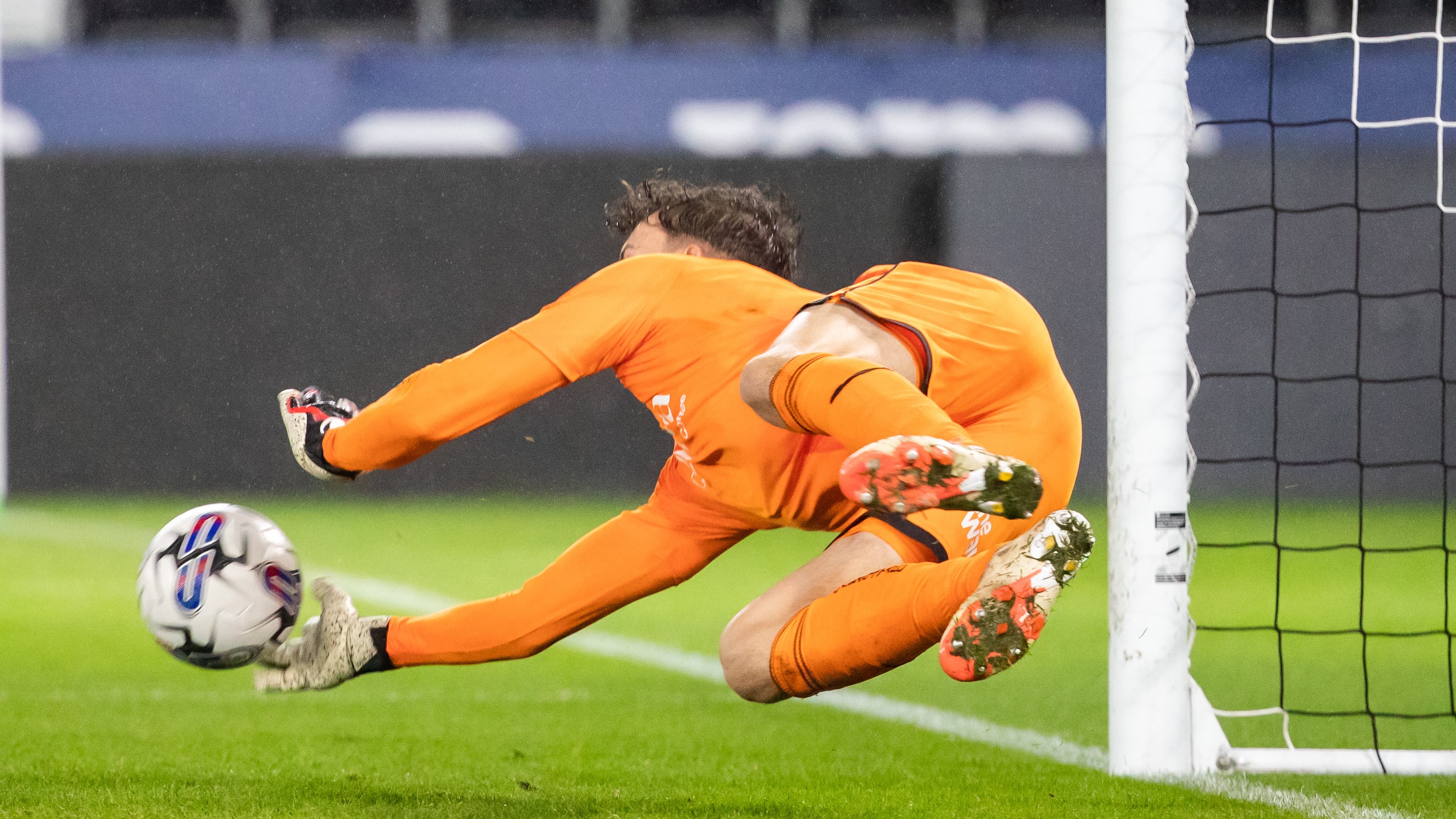 Evan Watts saves a penalty v Cardiff City