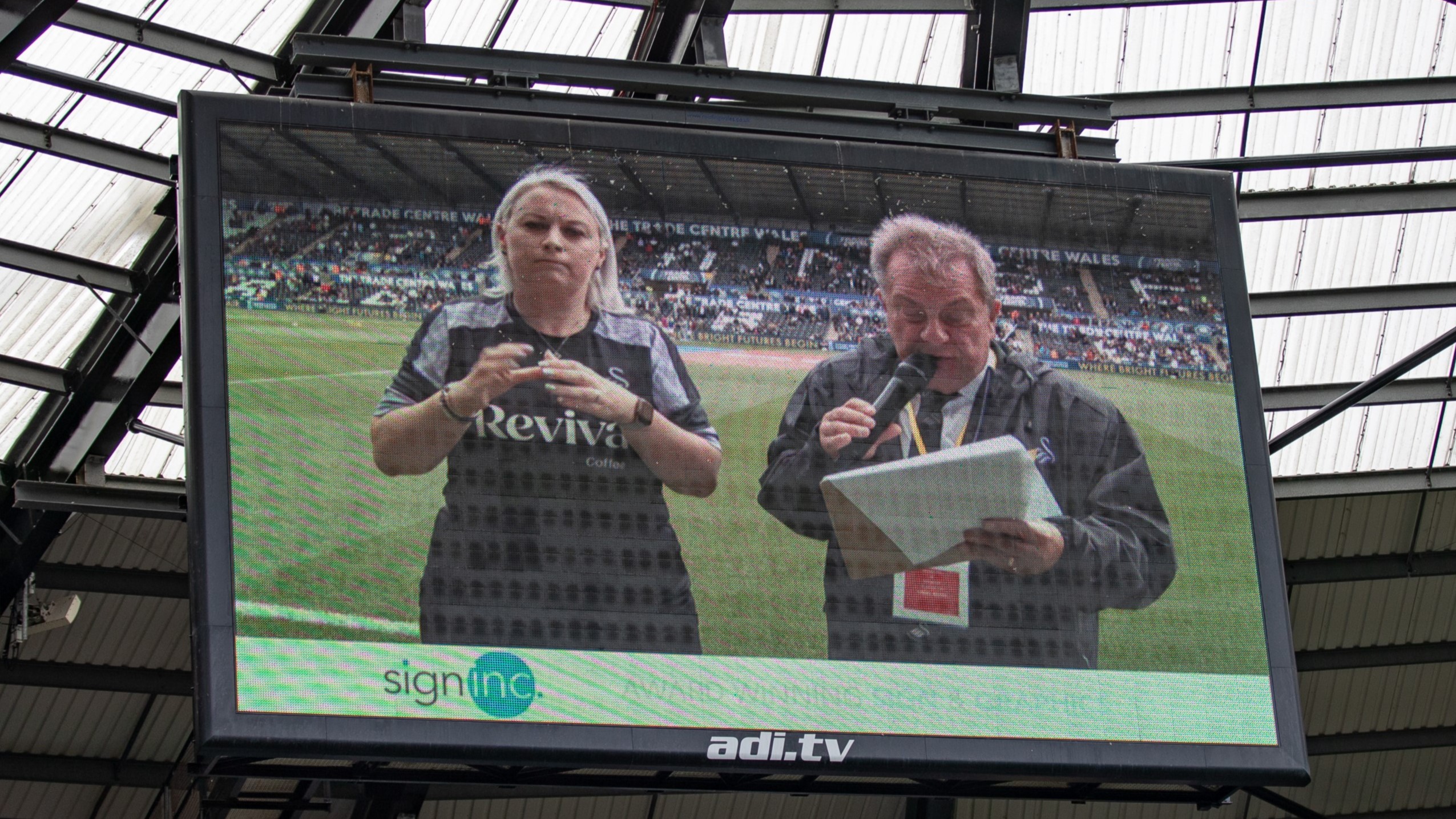 BSL on the Swansea City big screen 