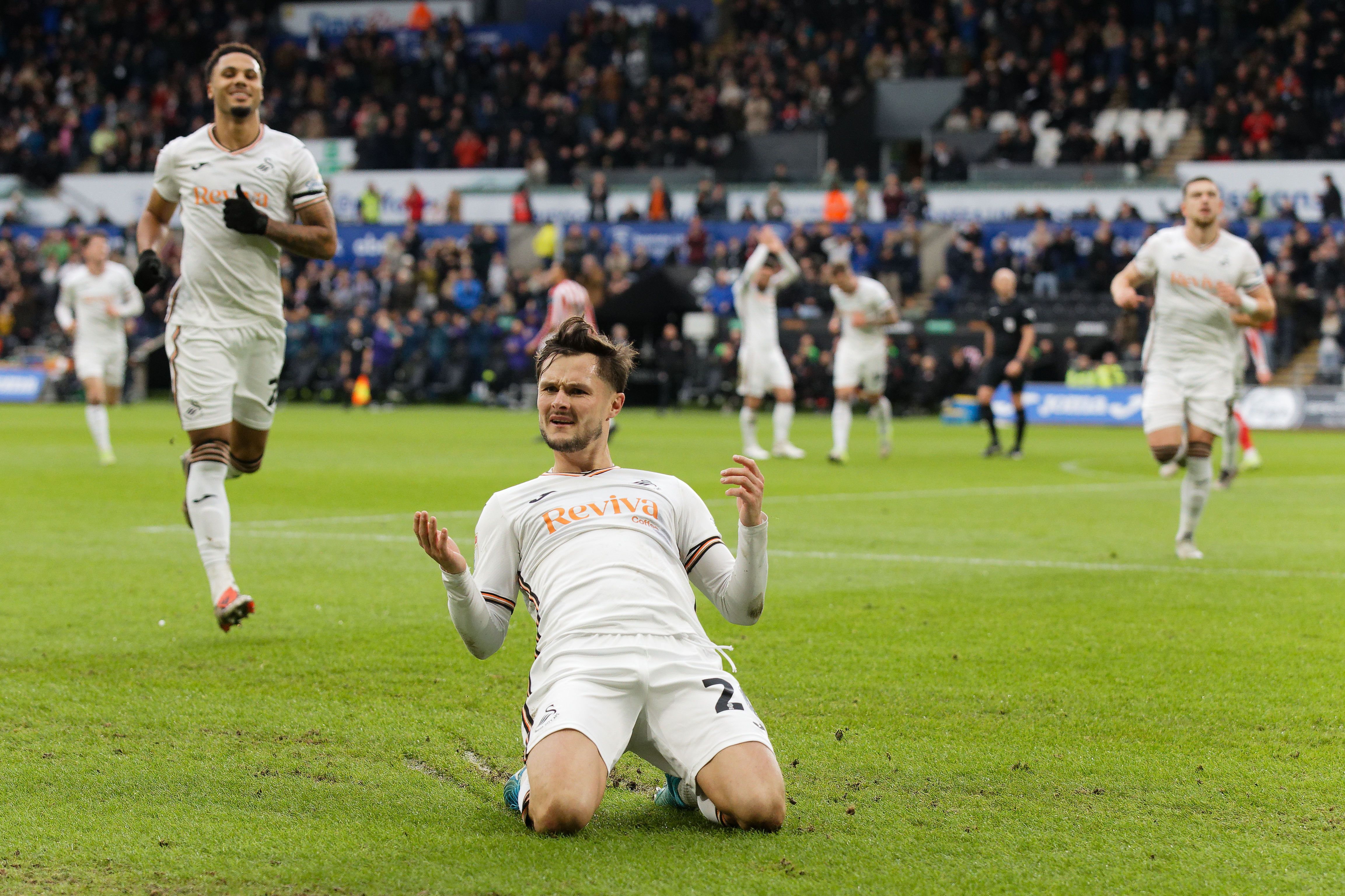 Liam Cullen celebrates 