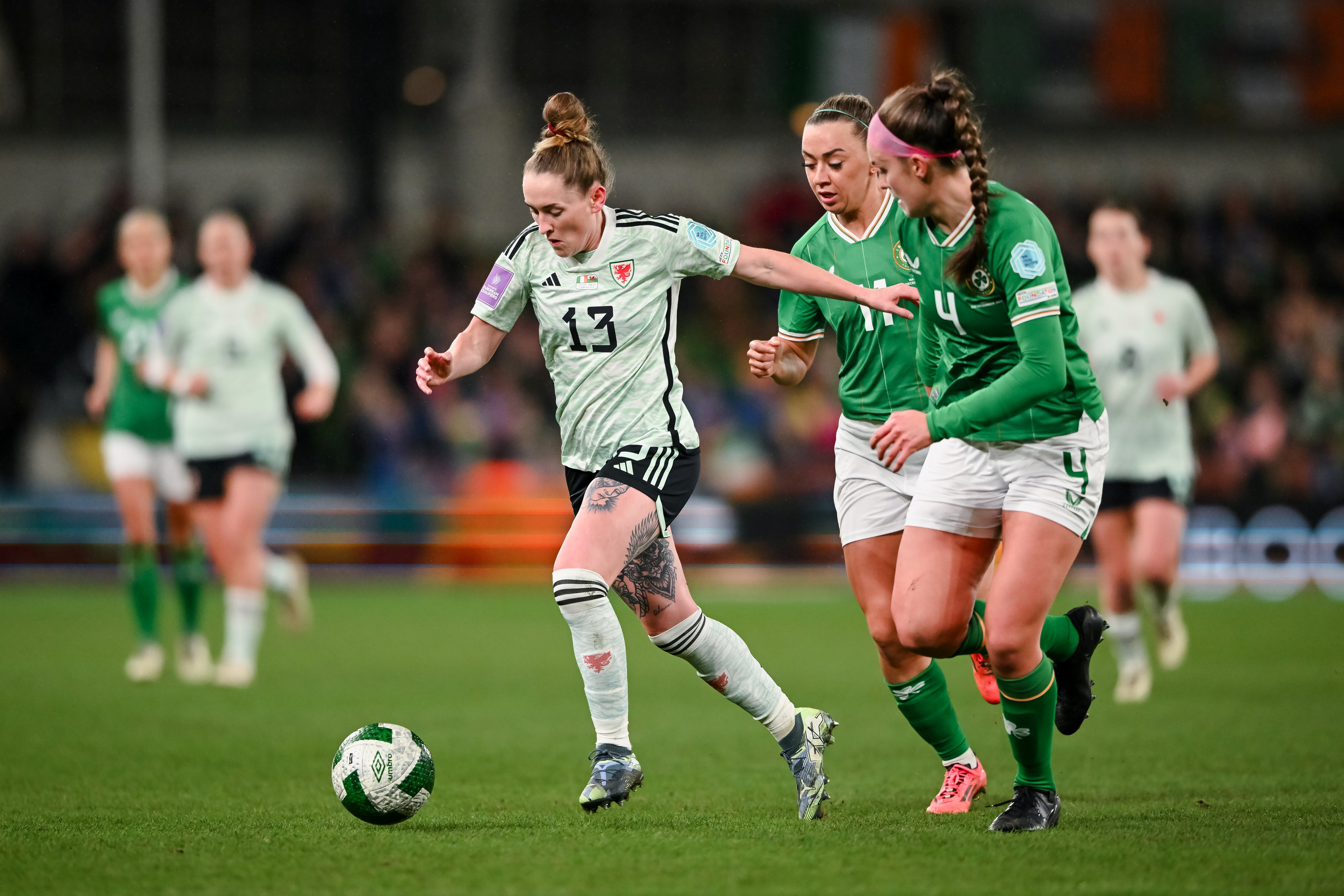 Ex-Swansea City player, Rachel Rowe in action for Wales