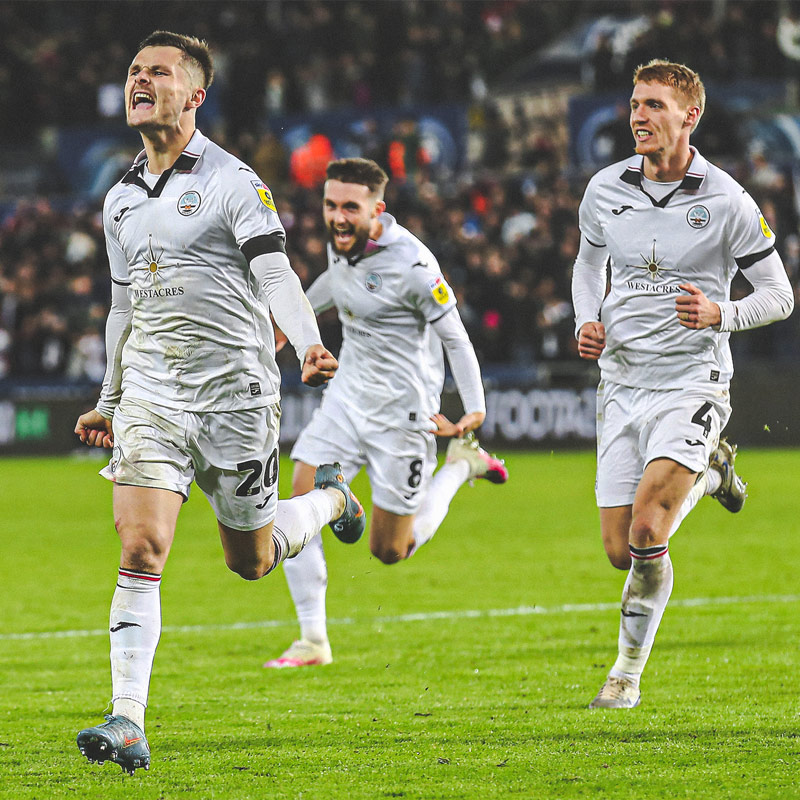 Cullen celebrating his goal at the Swansea.com Stadium.