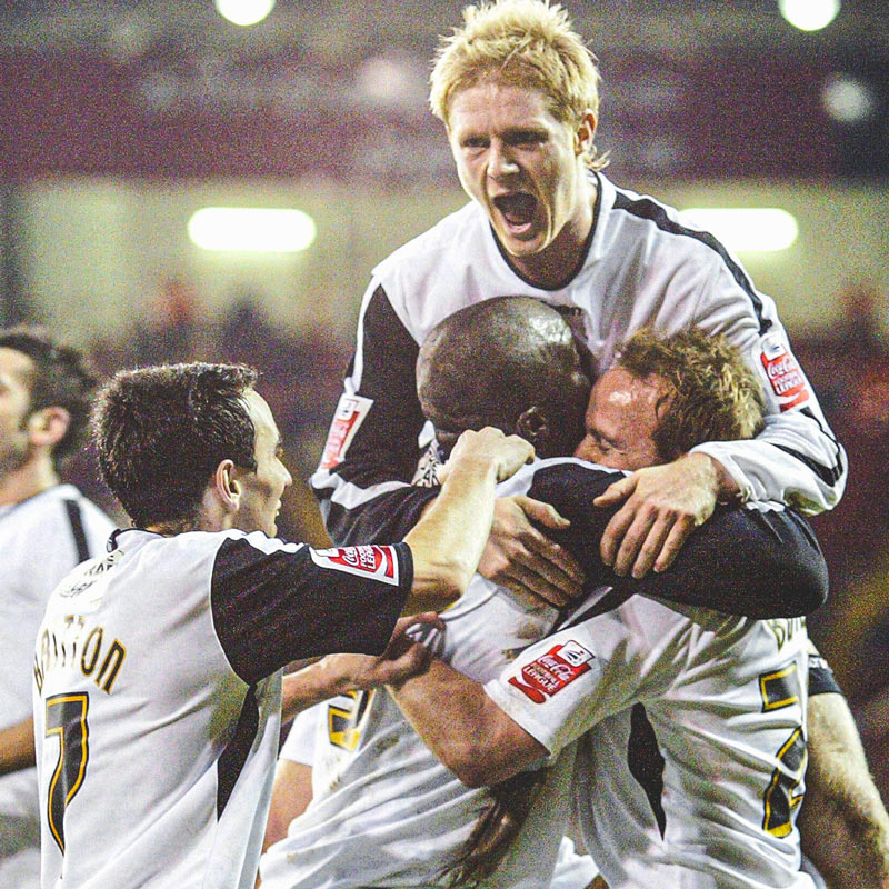 Photograph of team celebrating Thomas Butler scoring the second goal against Sheffield United