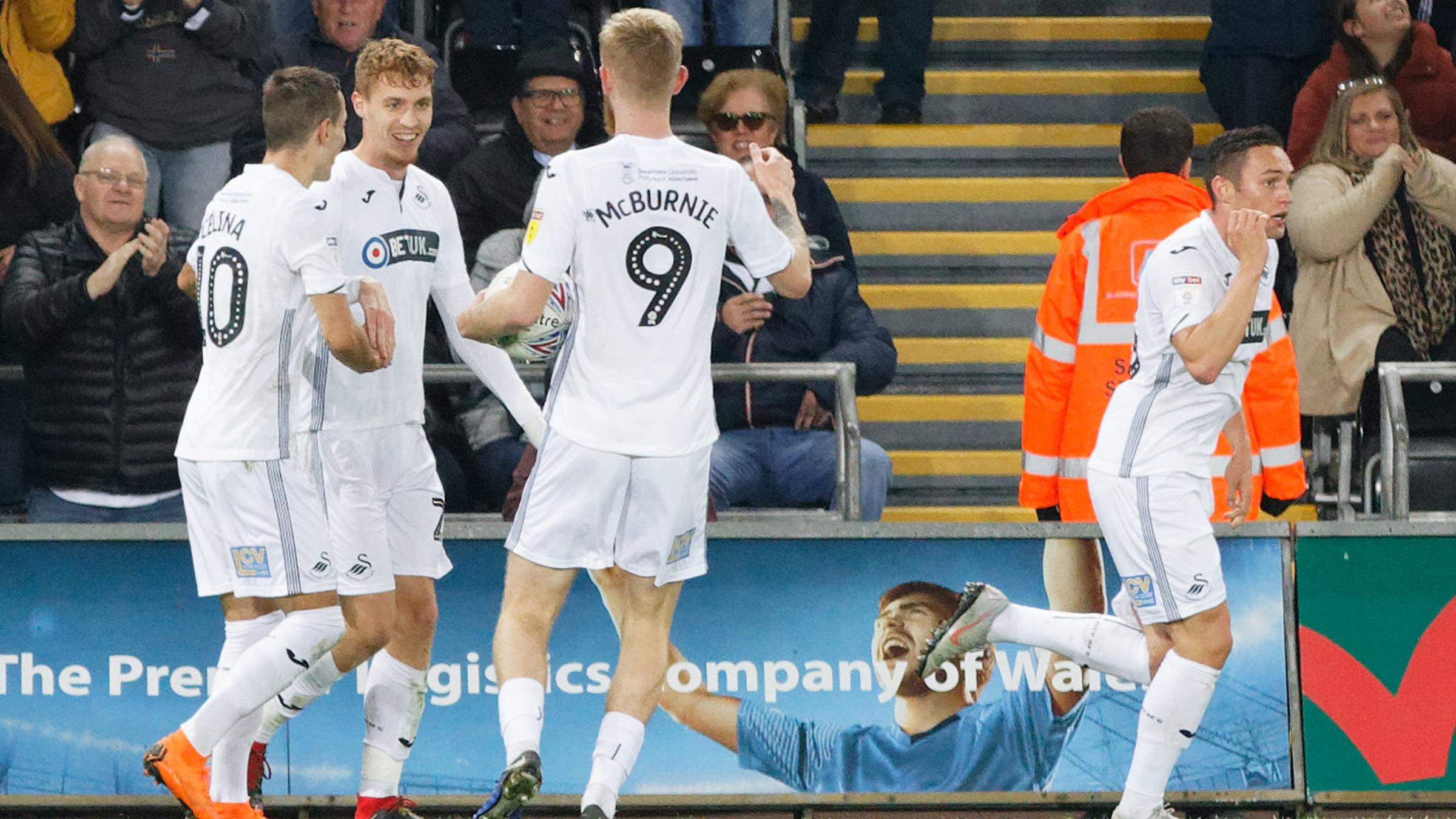 The Swans celebrate their goal