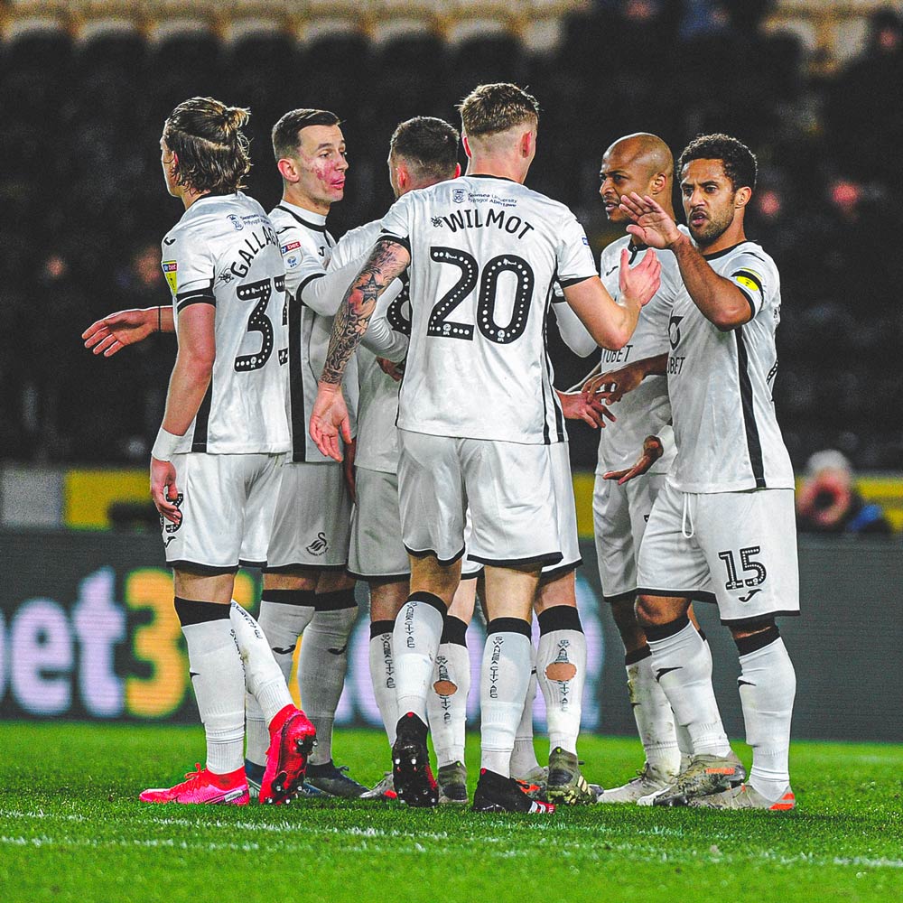 Photograph of Wayne Routledge celebrating scoring against Hull City