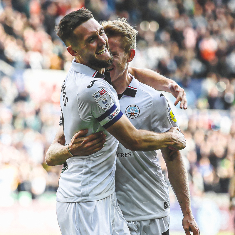 Grimes' celebrating with Ollie Cooper