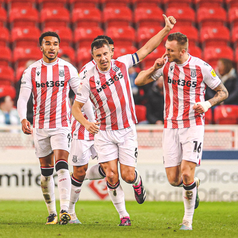 Stoke City squad celebrating scoring at the Bet365 stadium