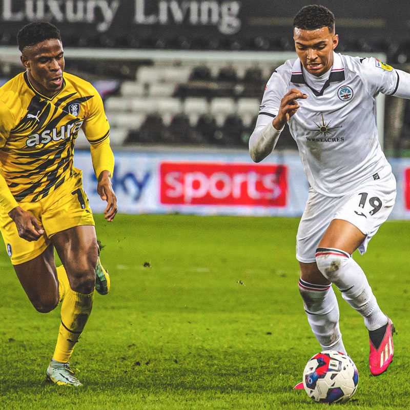 Photograph of Whittaker playing against Rotherham United