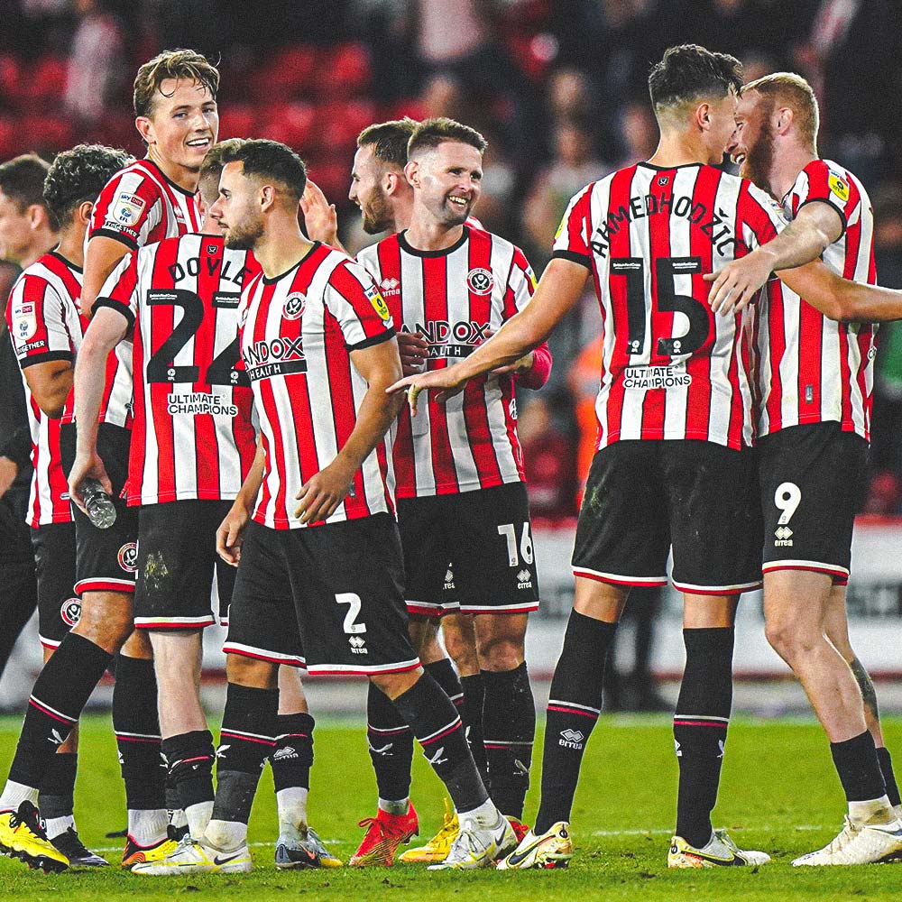 Sheffield United squad celebrating scoring at Bramall Lane